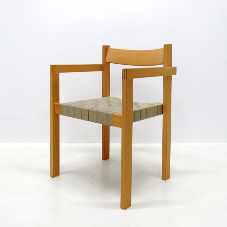 Wonderful 1970s side chairs 'Koldinghus' by Hans Wegner, with arms, in oak with straps of hemp, stackable, very comfortable. Priced individually.