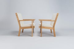 Hans Wegner Armchairs in Oak &  Cream Wool Boucle by Getama, Danish 1960’s