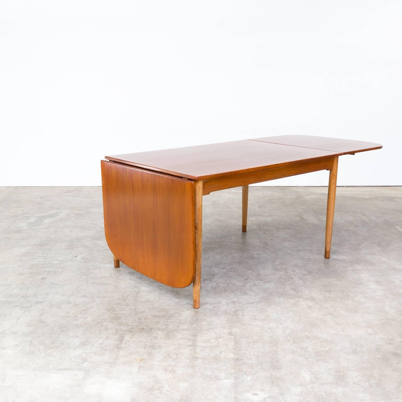 Hans Wegner beautiful rare drop leaf dining table. Very good condition consistent with age and use.