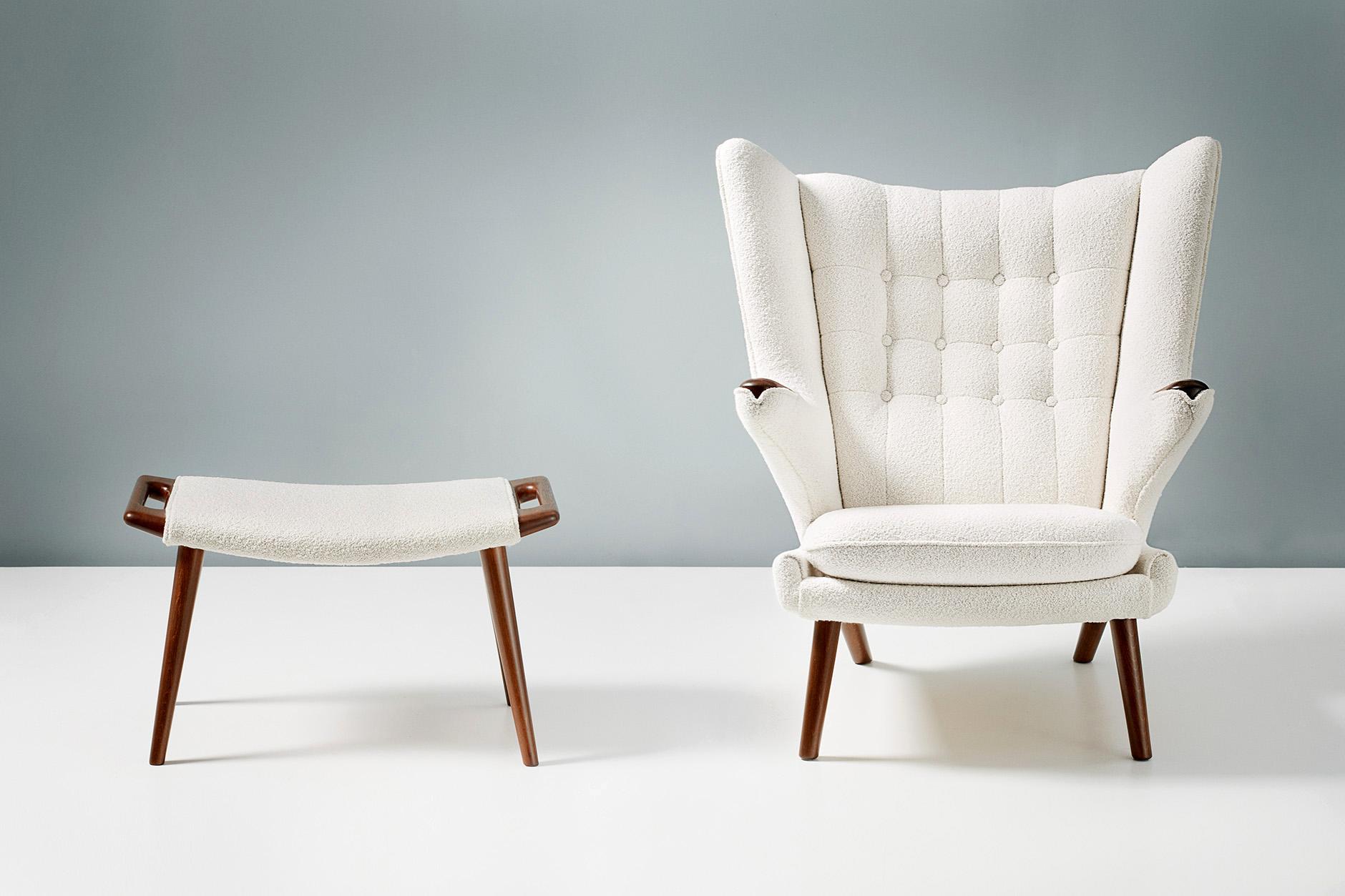 Hans J. Wegner

AP-19 Papa Bear chair and AP-29 ottoman, 1953

One of Wegner's most iconic designs. Produced by A.P. Stolen, Denmark with dark teak arms and legs on the armchair and handles on the matching ottoman. These examples have been