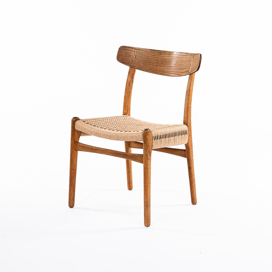 Set of six chairs, in solid oak with papercord seats. Designed by Hans J. Wegner for Carl Hansen & Son, Odense. Labeled by the maker. Great condition. 

Literature: Dansk Kunsthåndværk No. 11, November 1950, p. 195-196. (Danish magasin for Arts