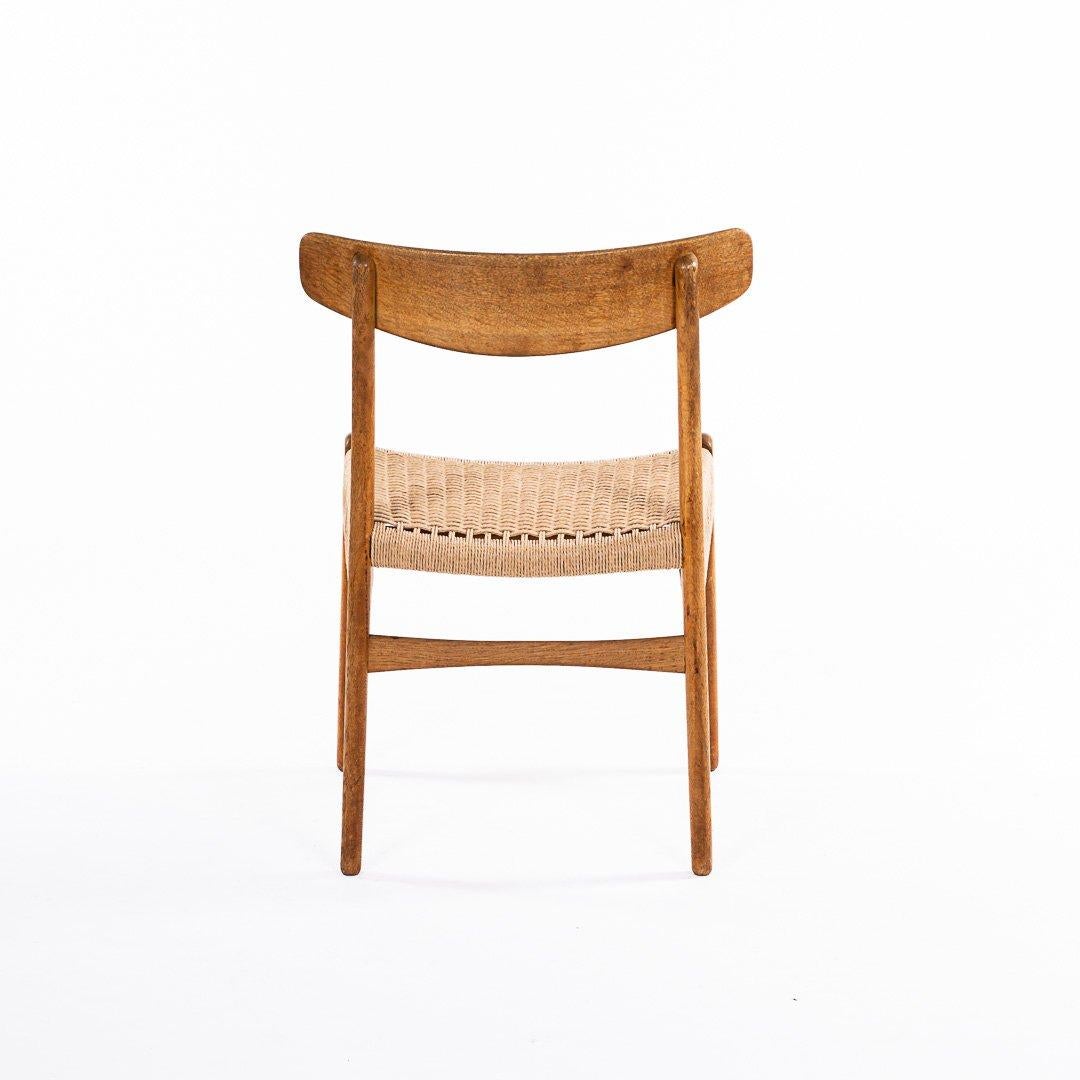 Hans Wegner CH 23 Chairs in Oak and Papercord, Denmark 1950s, Set of 6 In Good Condition In Madrid, ES