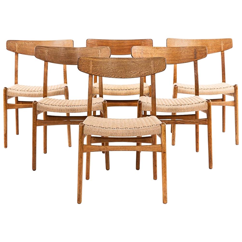 Hans Wegner CH 23 Chairs in Oak and Papercord, Denmark 1950s, Set of 6
