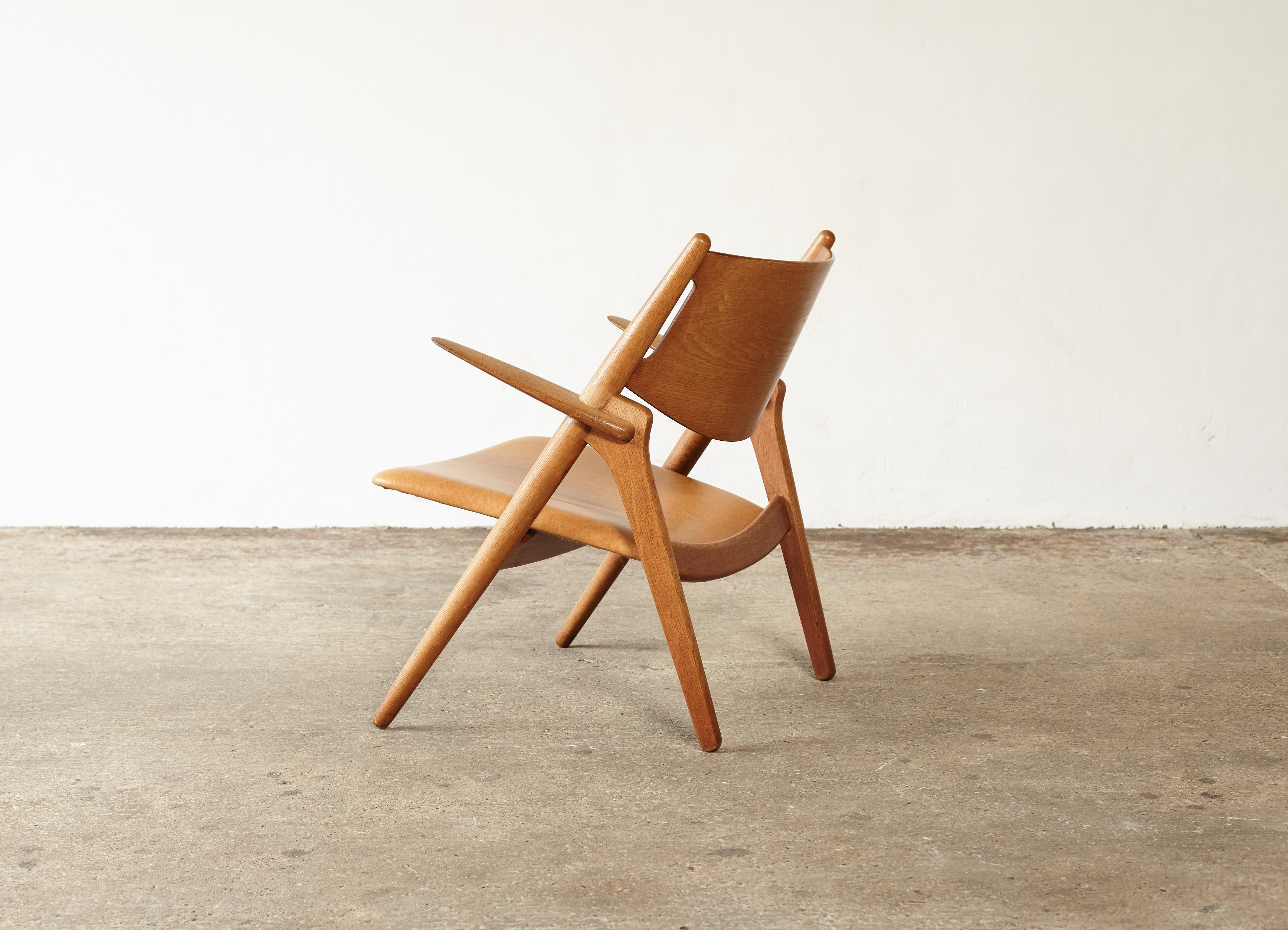 Danish Hans Wegner CH-28 Oak Sawbuck Armchair, 1950s, Denmark