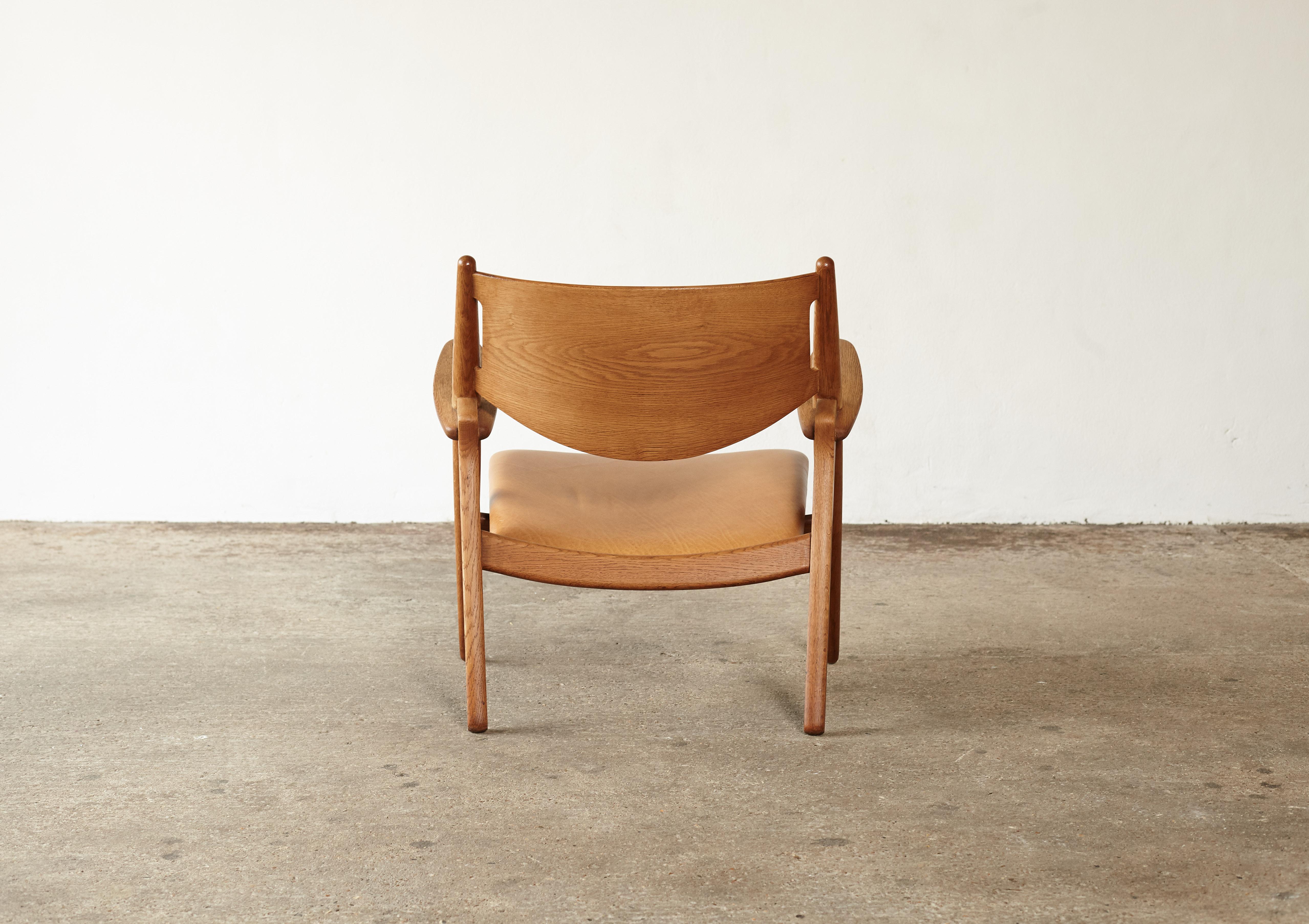 Hans Wegner CH-28 Oak Sawbuck Armchair, 1950s, Denmark In Good Condition In LEWES, GB