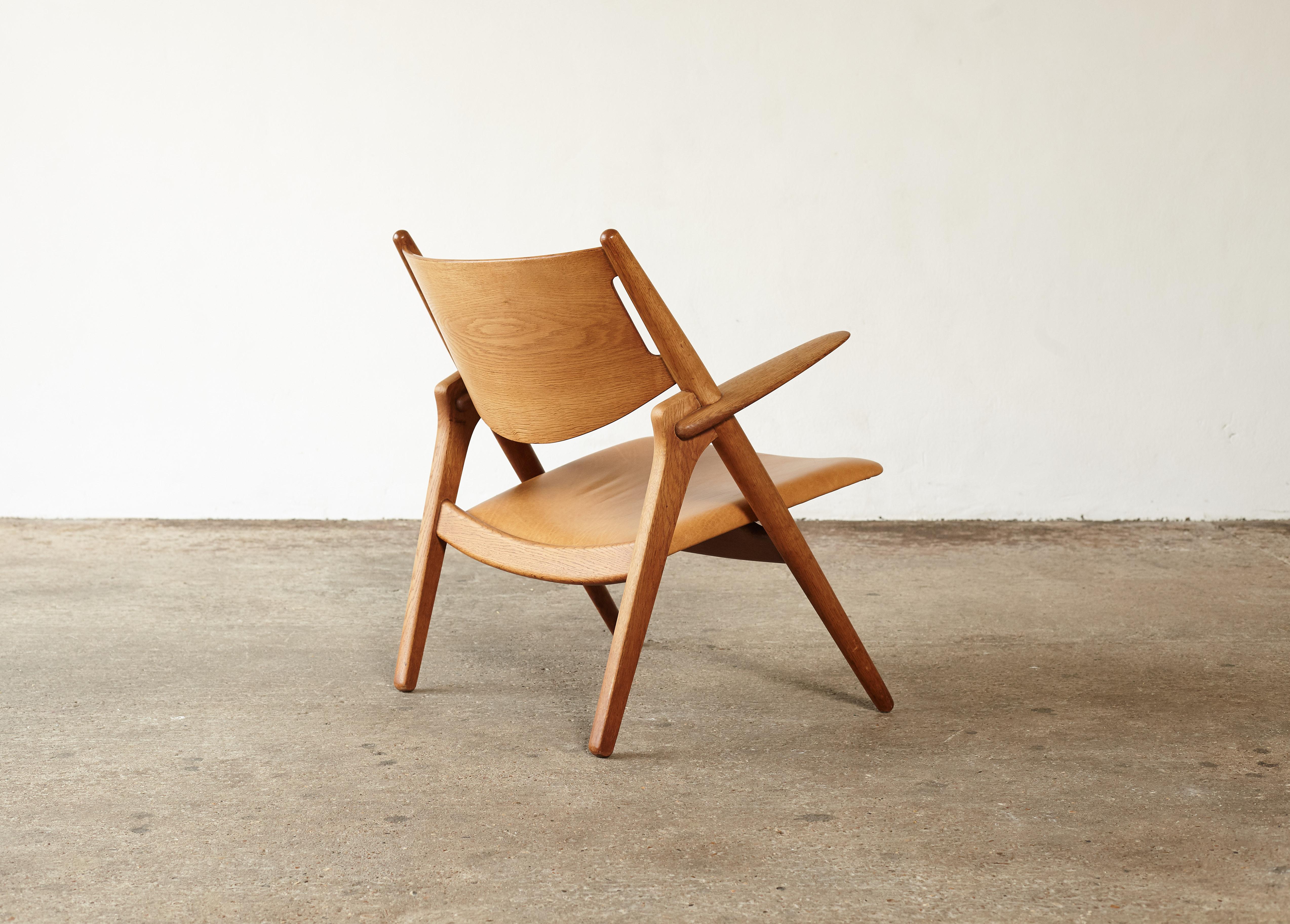20th Century Hans Wegner CH-28 Oak Sawbuck Armchair, 1950s, Denmark