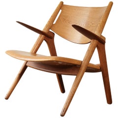 Hans Wegner CH-28 Oak Sawbuck Armchair, 1950s, Denmark