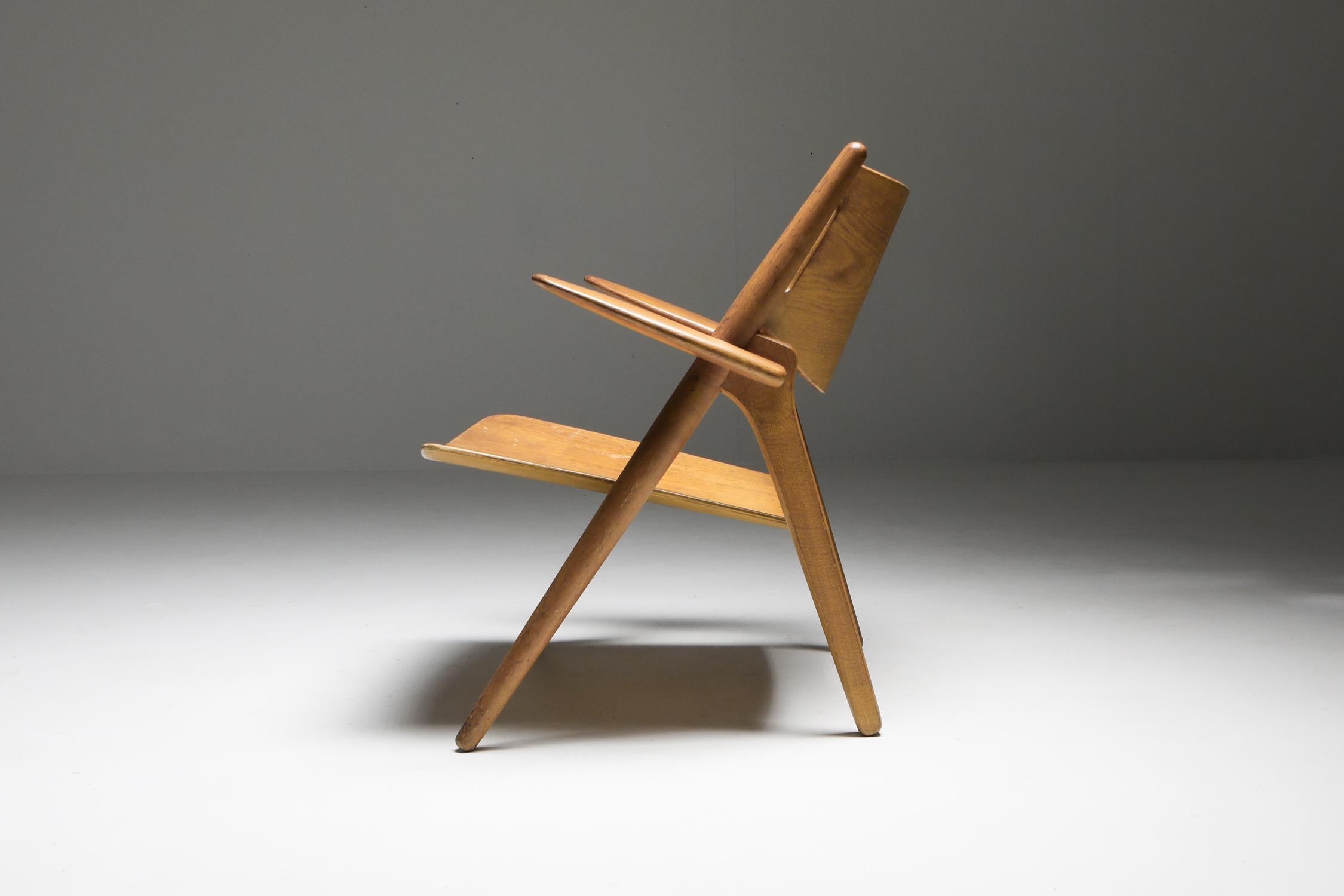 Danish modern, ch28 easy chair, Design Hans Wegner, 1952, Denmark

This is an original old early production chair. In great condition with a stunning patina.

The CH28 was originally designed in 1952. It is an elegant, very comfortable, pure