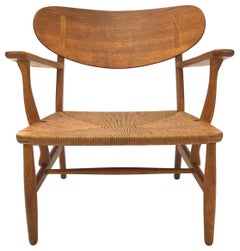 Hans Wegner CH22 Loungesessel aus Teak und Eiche