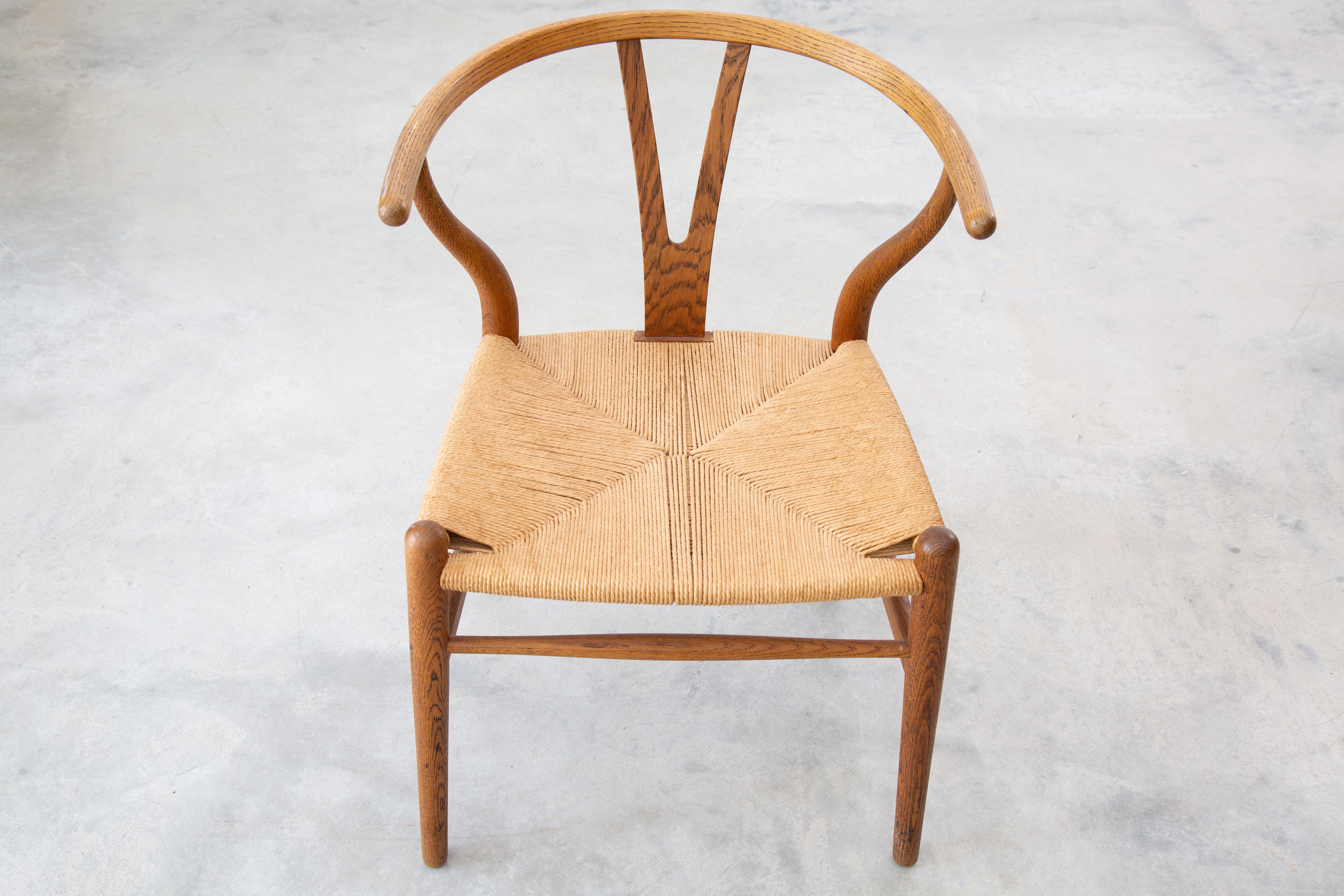 Hans Wegner CH24 Wishbone chair in oak and papercord circa 1953 Illums Bolighus 1