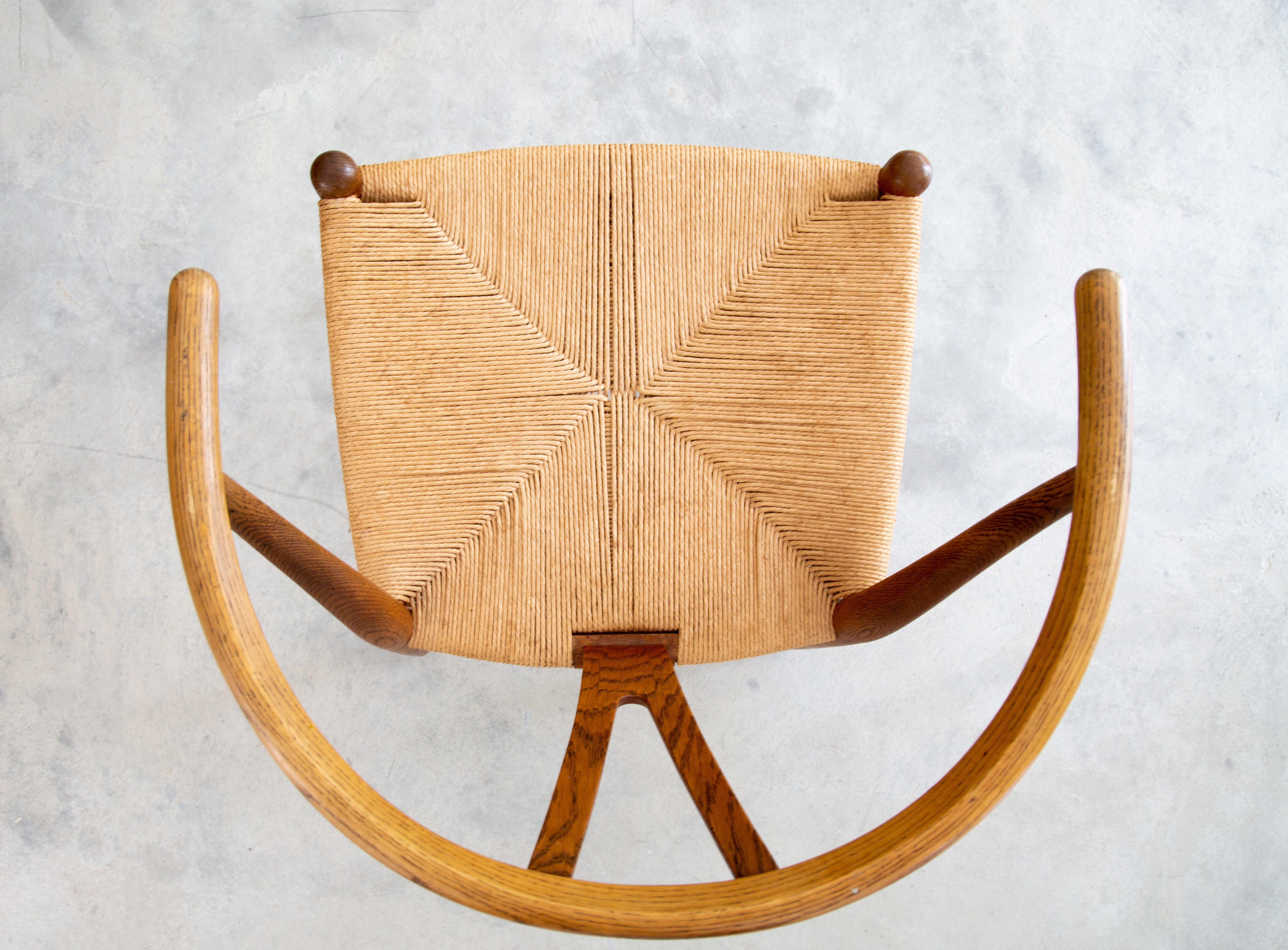 Danish Hans Wegner CH24 Wishbone chair in oak and papercord circa 1959 Illums Bolighus For Sale