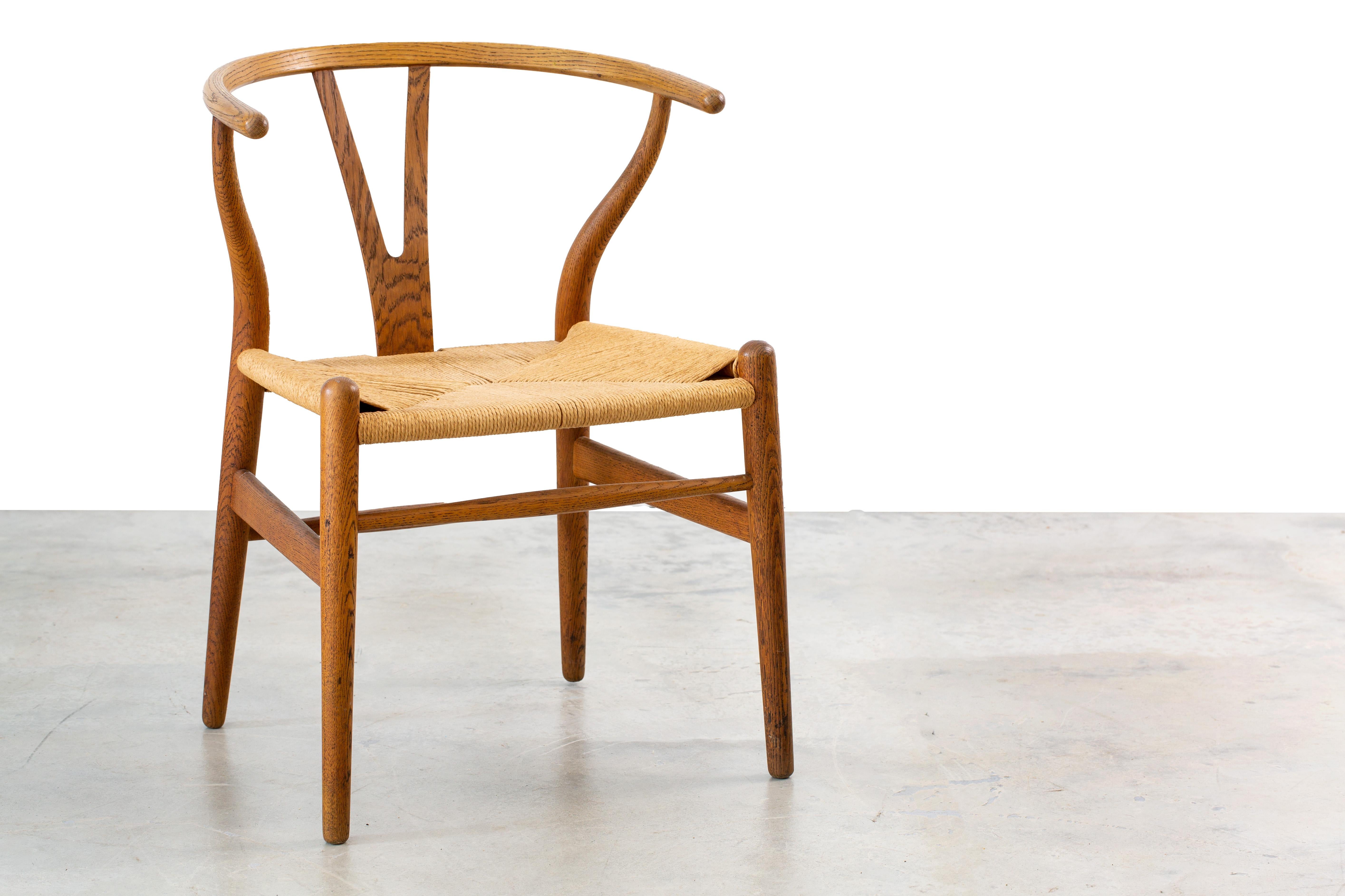 Mid-20th Century Hans Wegner CH24 Wishbone chair in oak and papercord circa 1959 Illums Bolighus For Sale