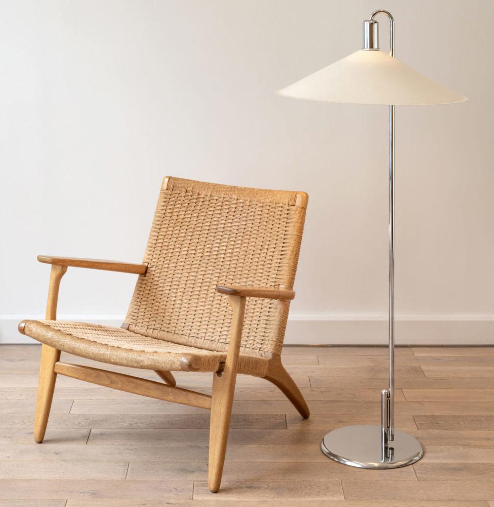 CH25 model Lounge chair designed by Hans Jørgensen Wegner and edited by Carl Hansen. Hans Wegner was born in 1914, in Denmark, as a remarkable designer, he thought and created more than 500 chairs in his lifetime and career. For this reason, he was