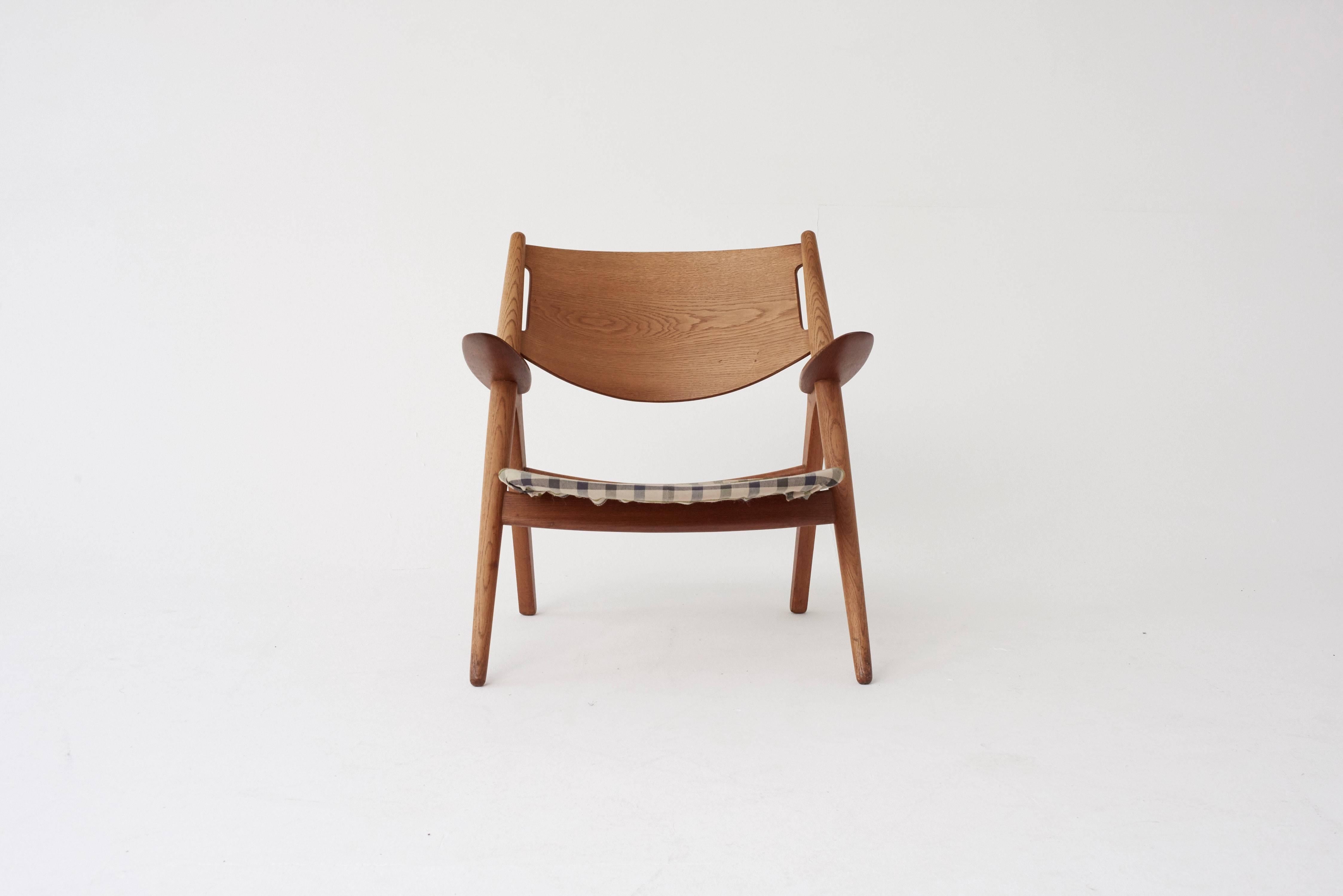 Hans Wegner CH28 Oak Sawbuck Armchair, 1950s, Denmark 1