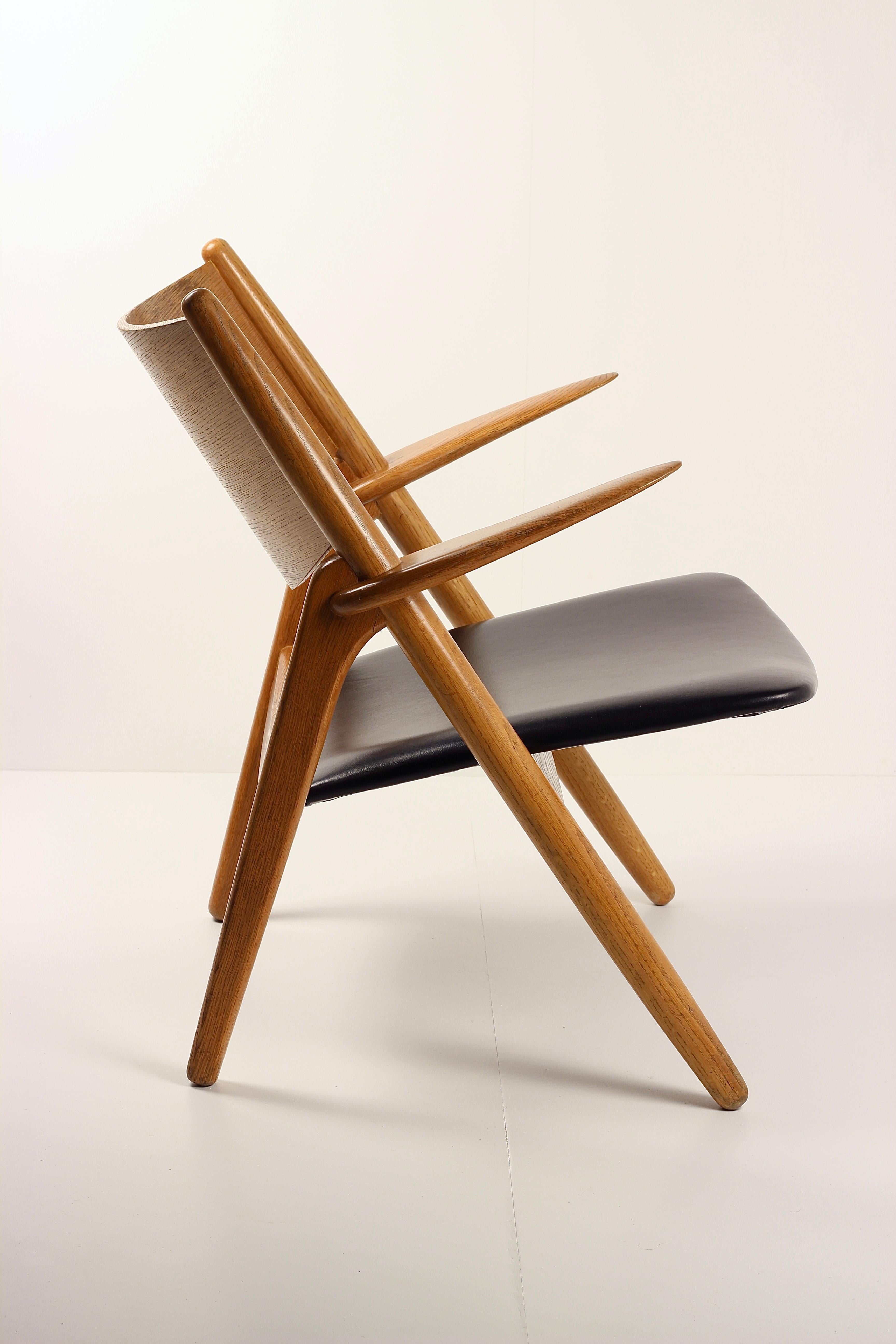 Mid-Century Modern Hans Wegner CH28 Sawback Lounge Chair Danish Modern Icon by Carl Hansen & Søn For Sale