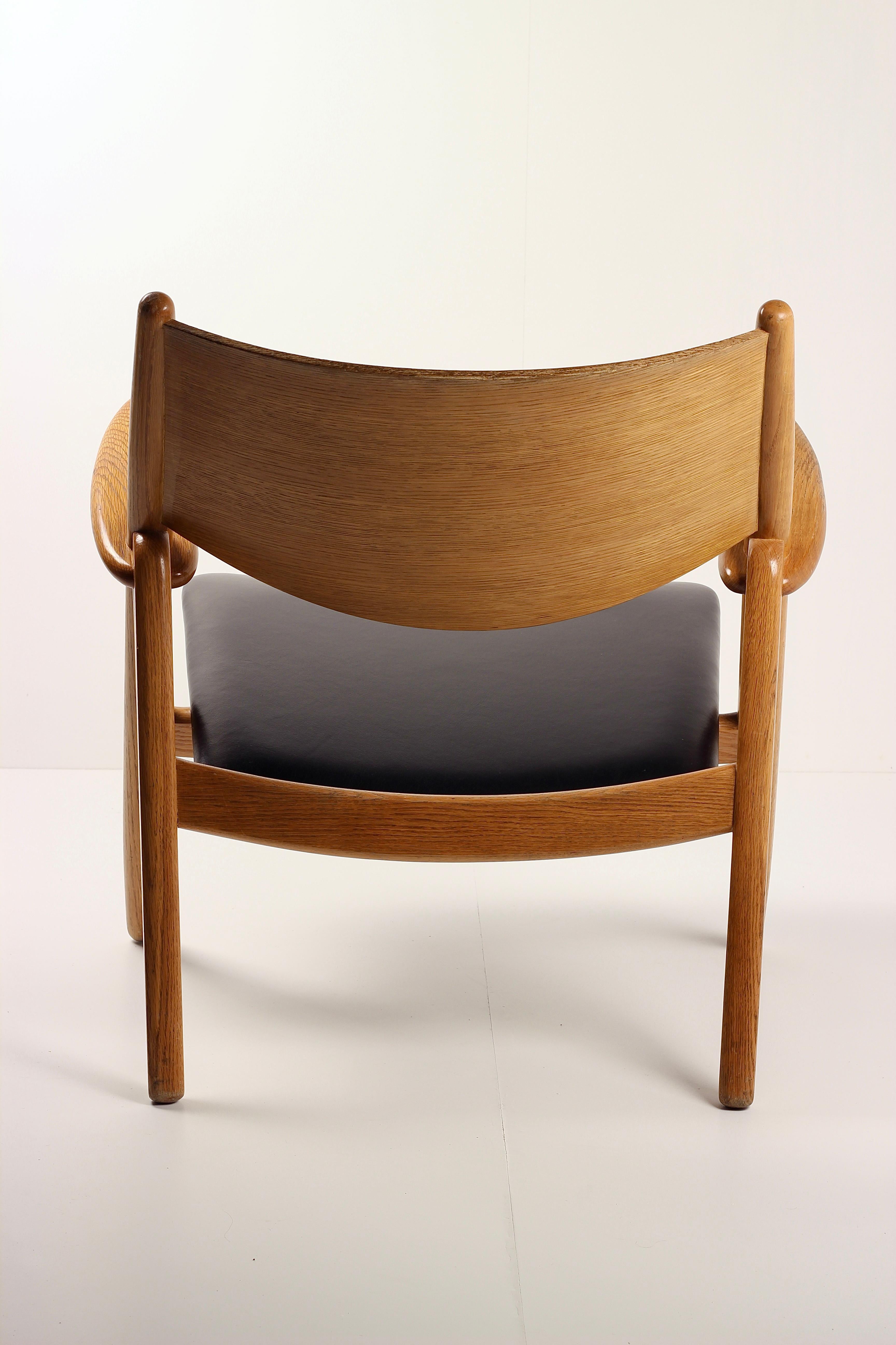 Contemporary Hans Wegner CH28 Sawback Lounge Chair Danish Modern Icon by Carl Hansen & Søn For Sale