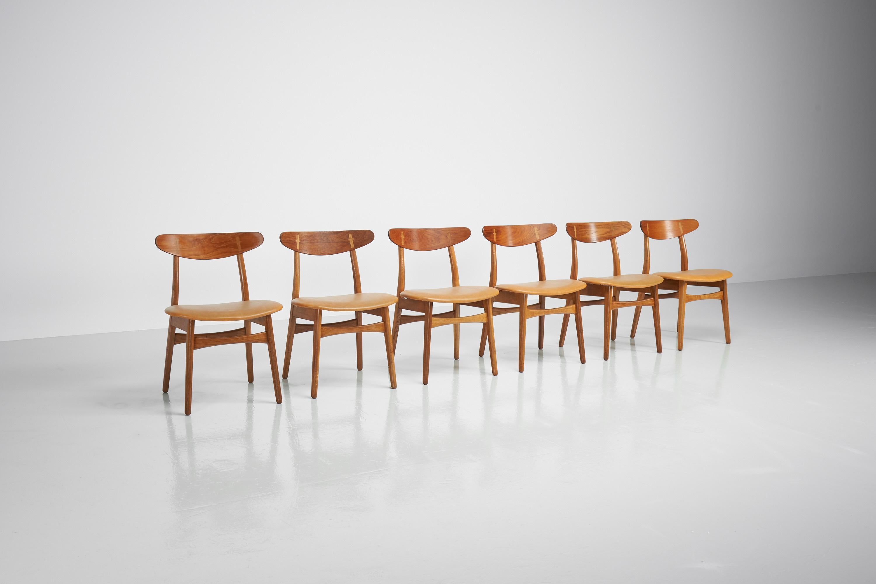Stunning set of 6 dining chairs model CH30 designed by Hans J. Wegner and manufactured by Carl Hansen & Son, Odense Denmark 1950. These chairs are an early design by Wegner as they were first introduced already in 1950. The chair features organic