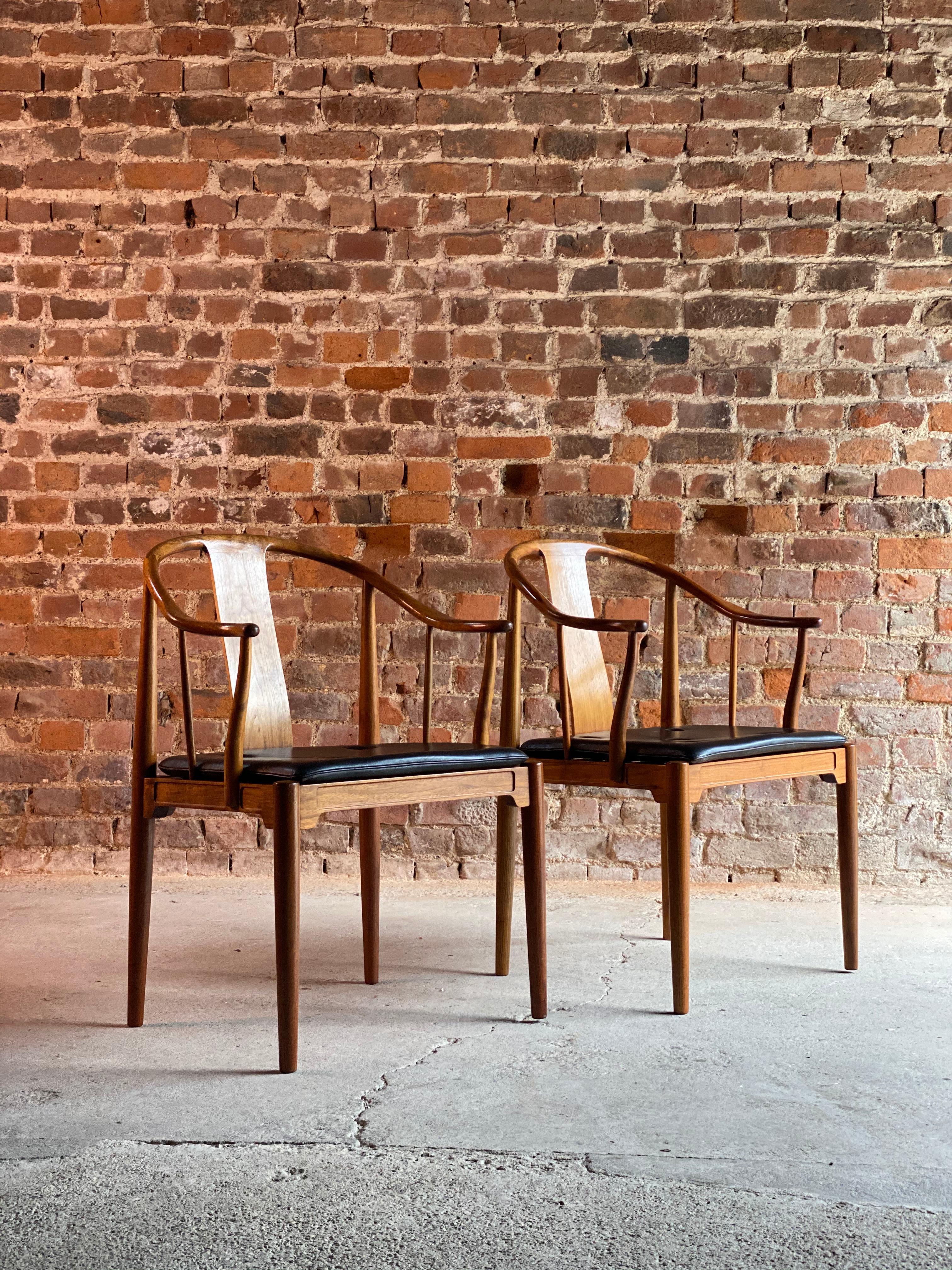 Hans J. Wegner China chairs in walnut for Fritz Hansen, Denmark, 1977

Midcentury Danish design, extremely rare and signed limited edition pair of Hans J Wegner model FH4283 ‘China’ chairs, the elegant walnut frames with original untouched black