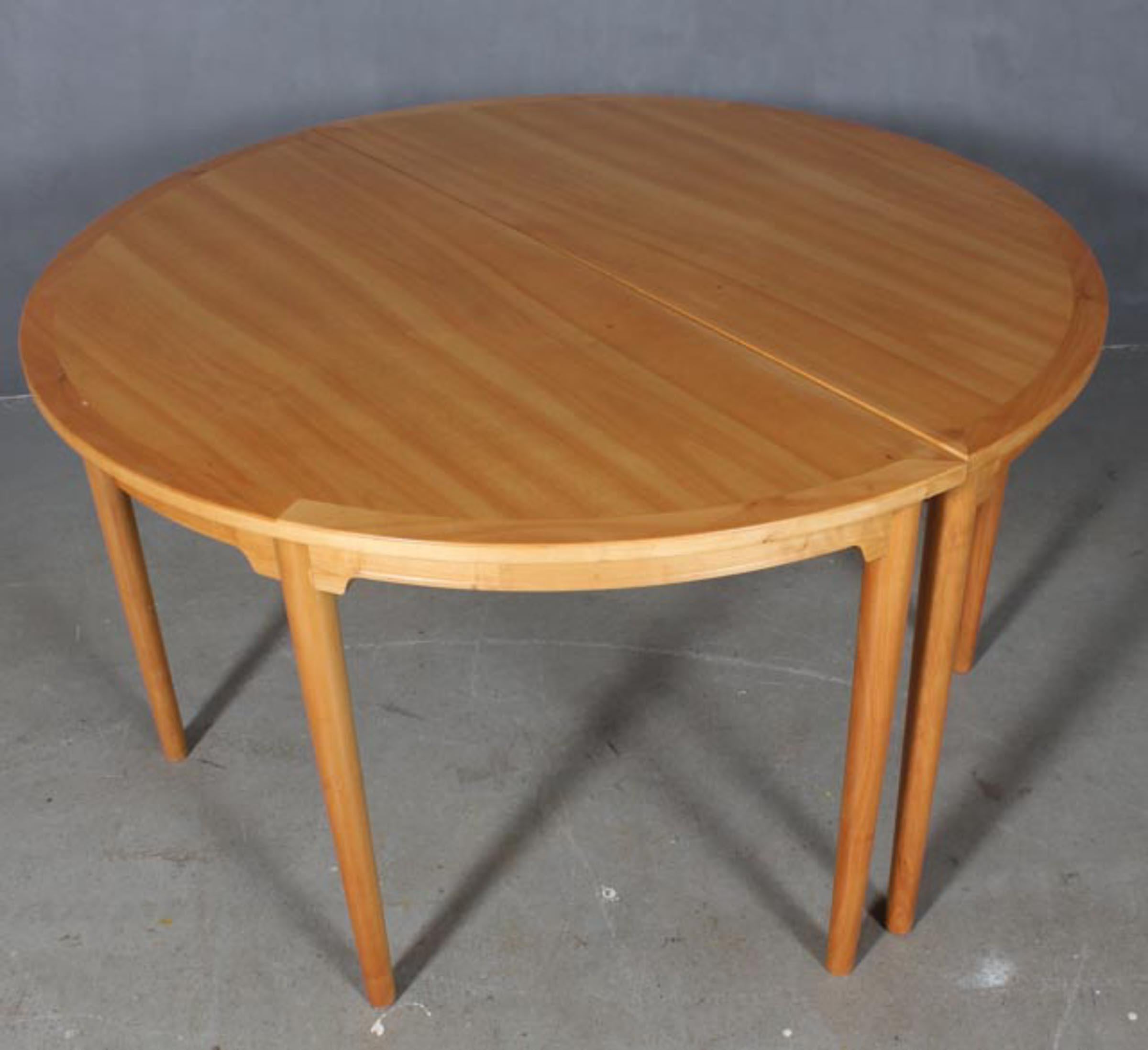 Hans J. Wegner chinese table with frame of cherry.

Two D shaped tables.