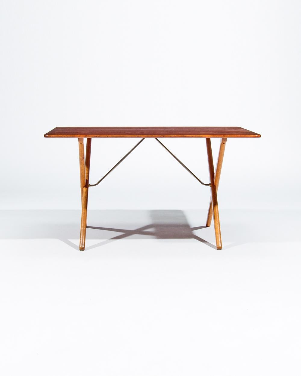 A Rare X-frame coffee table / sofa table AT-308 designed by Hans Wegner for cabinetmaker Andreas Tuck in the 1950s. A rare and interesting piece of design a really standout piece showing the skill of one of Denmark’s finest furniture designers Hans