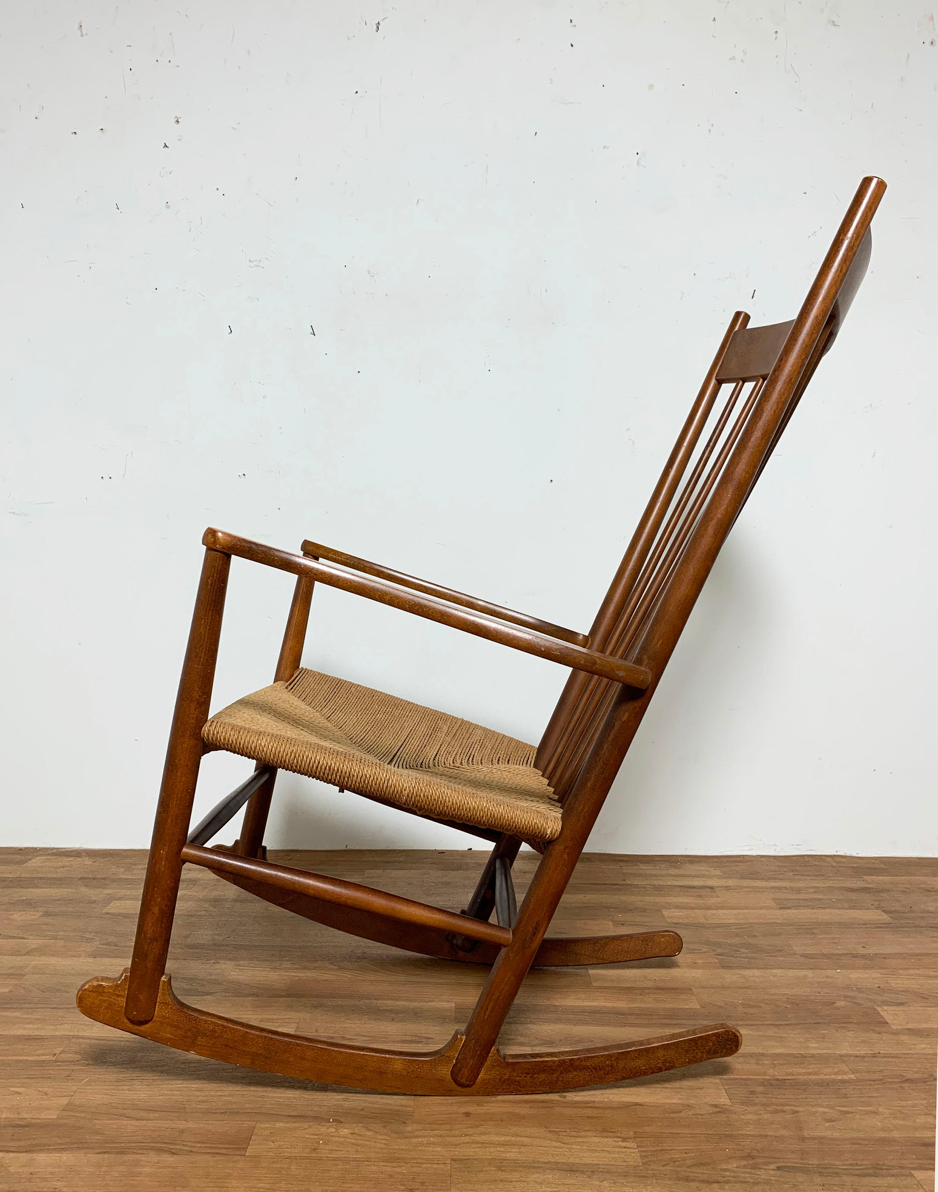 Hans Wegner “J16” rocker with corded seat for FDB Mobler, Denmark. Created in 1944, this has been one of Wegner’s most widely recognized designs. Marked with a production date of 1983.