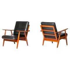 Hans Wegner Danish mid century Lounge chairs GE 270 in black leather and teak