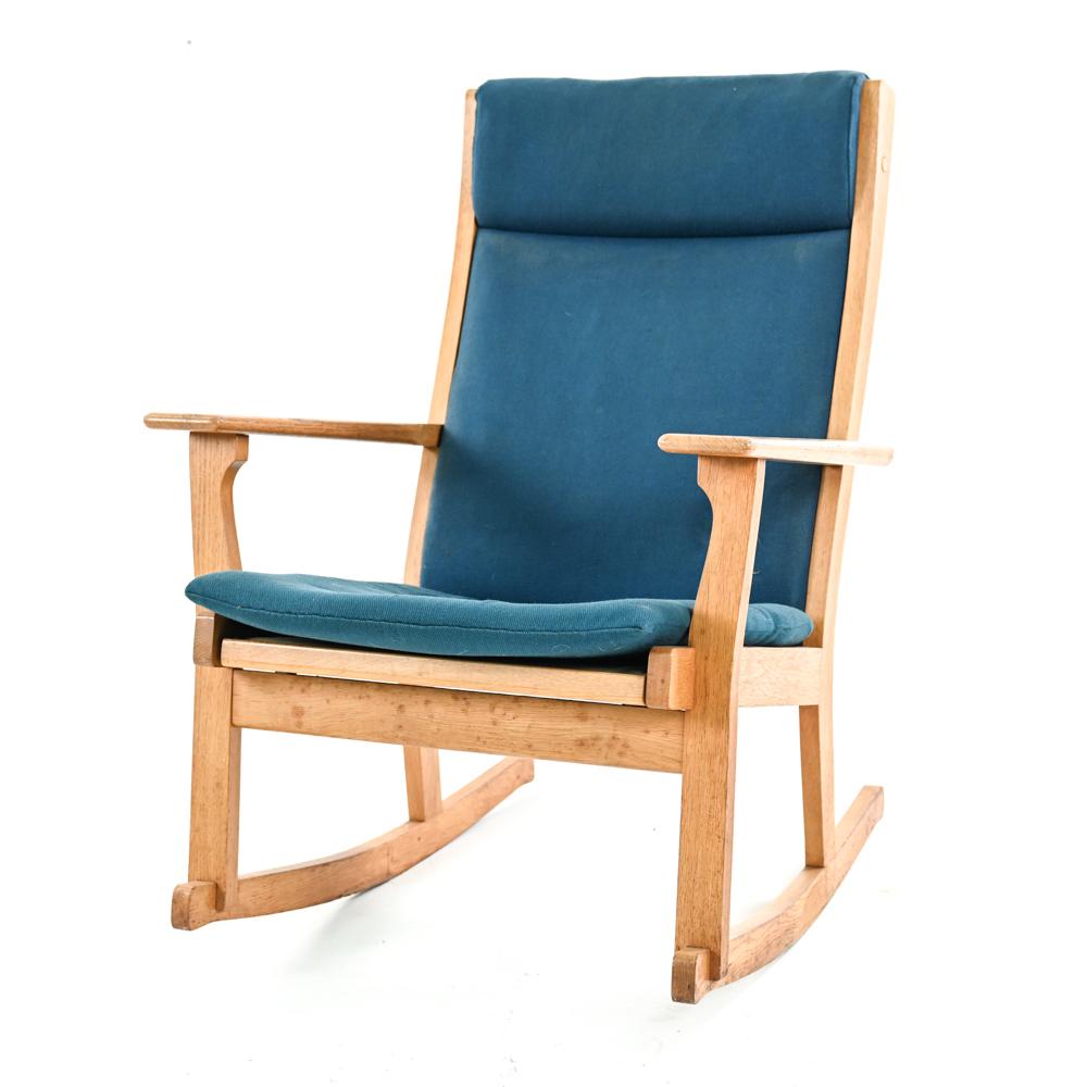 A mid-20th century Scandinavian modern rocking chair designed by Hans Wegner.