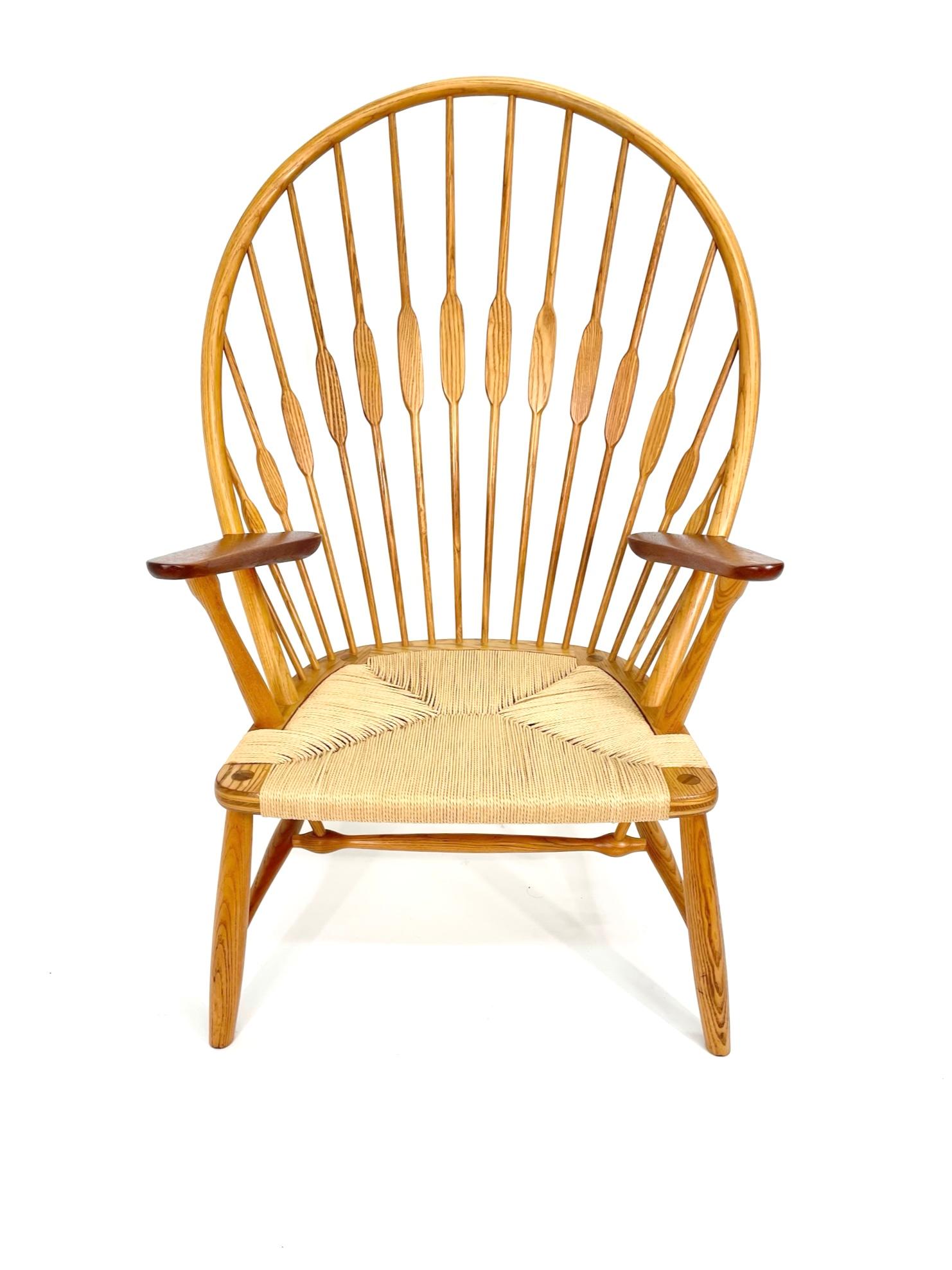 Modeled after a traditional American Windsor chair, Hans Wegner’s Peacock chair strips the form to reveal its construction while retaining aesthetic, decorative impact. The chair reveals a modernist approach to designing around the human body and