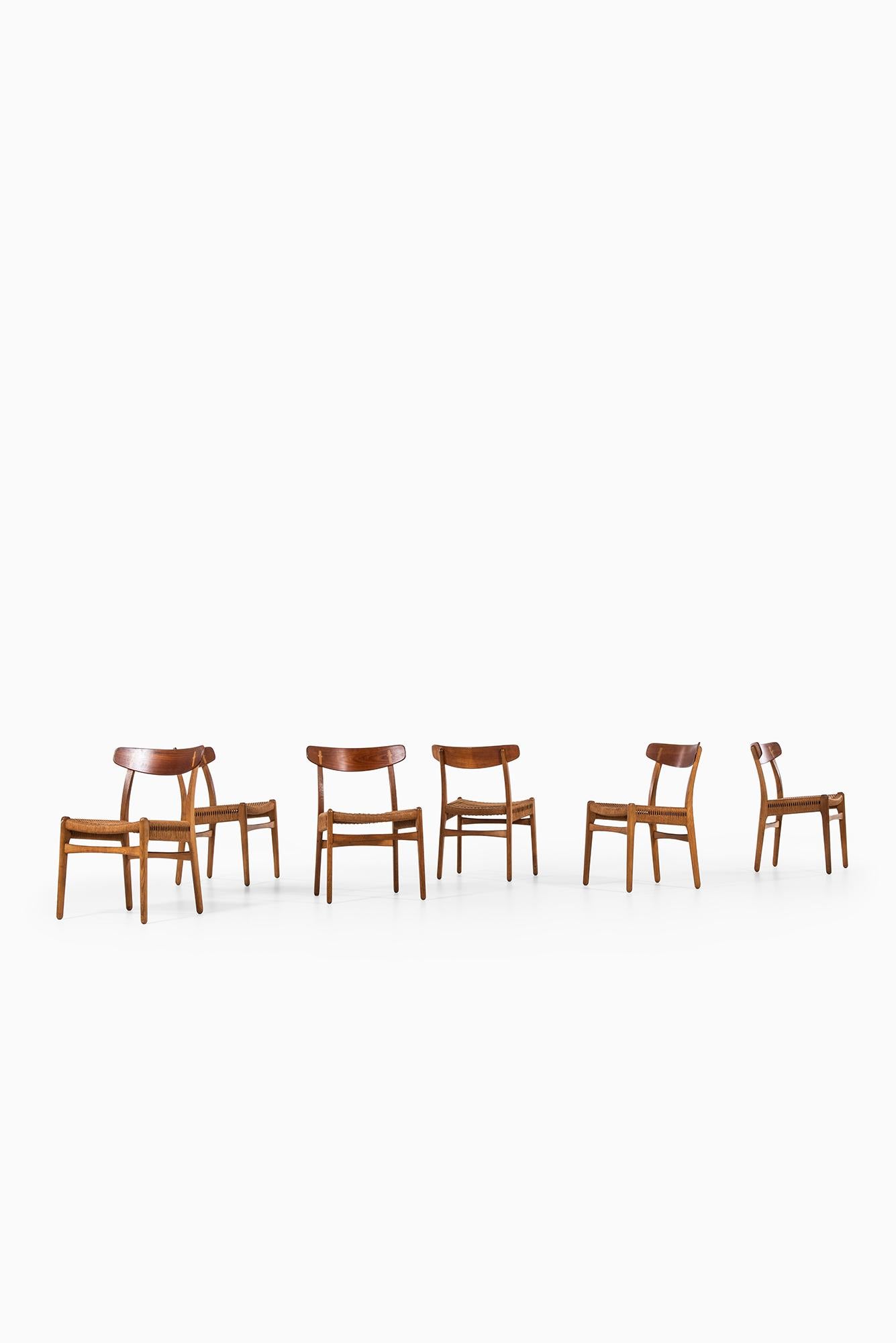 Set of six dining chairs model CH-23 designed by Hans Wegner. Produced by Carl Hansen & Son in Denmark.