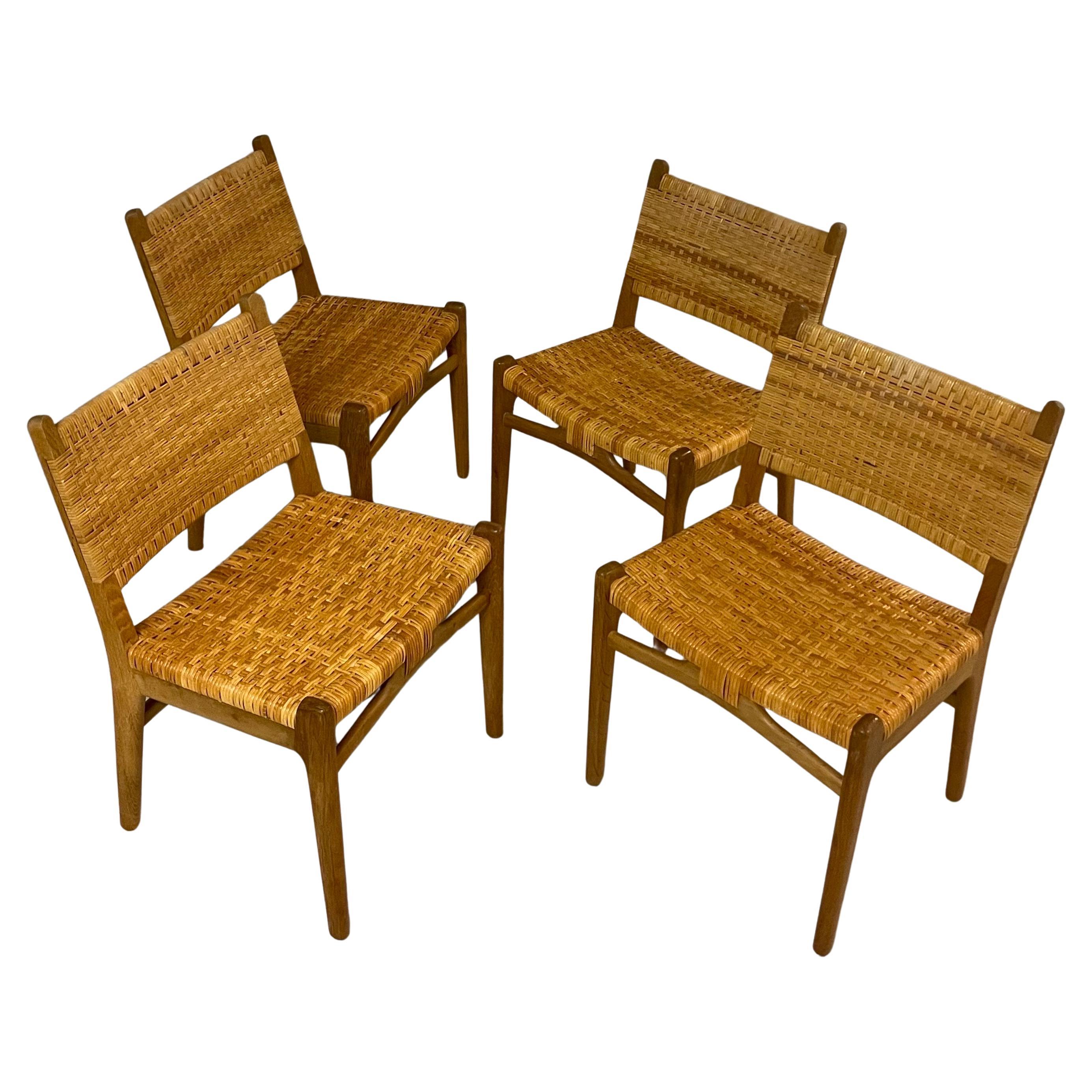 Chaises de salle à manger Hans Wegner modèle CH31 en chêne et rotin en vente