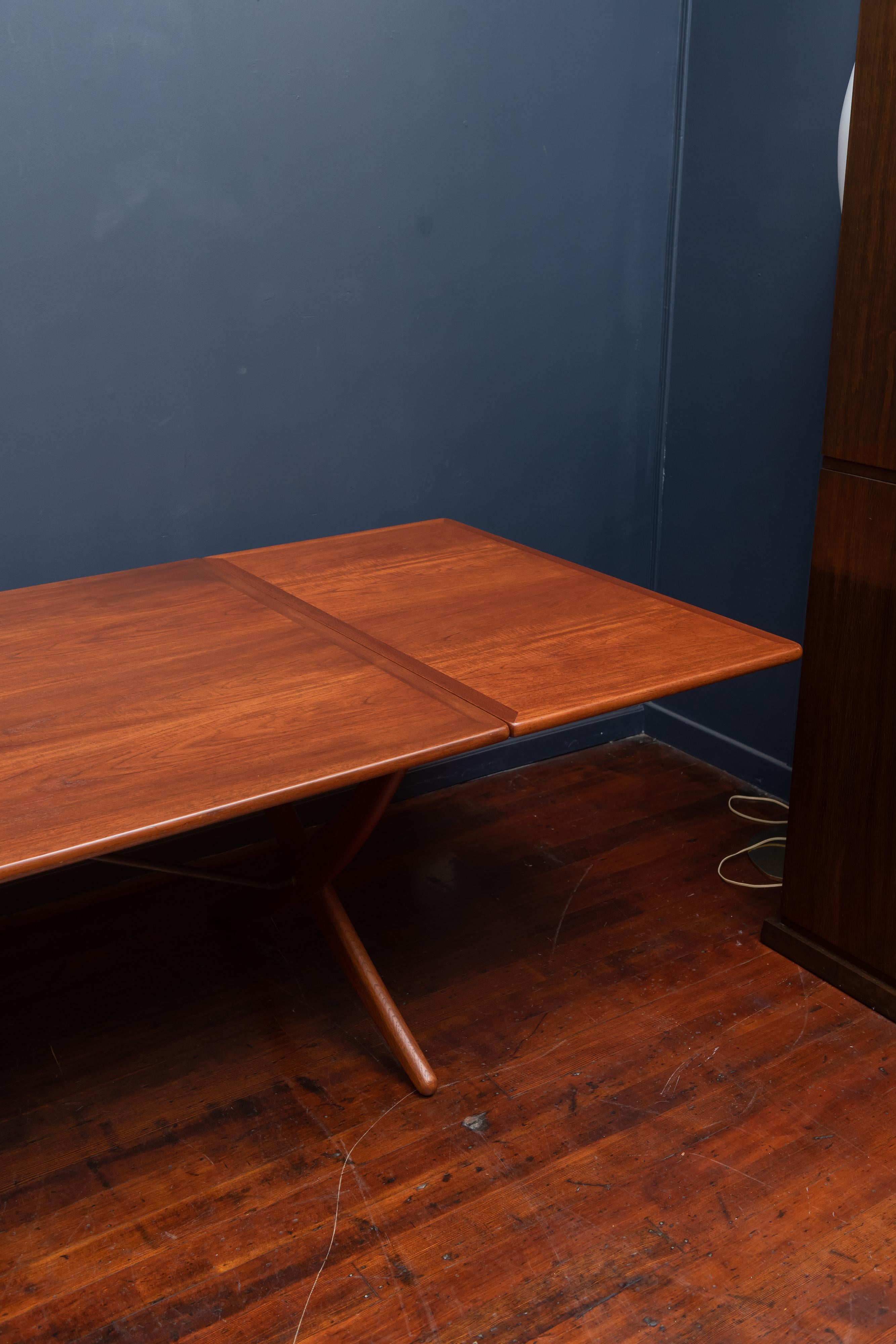 Hans Wegner teak and oak drop leaf dining table, model AT-314 for Andreas Tuck. Perfectly refinished and ready to enjoy, stamped. Dining table width is 122