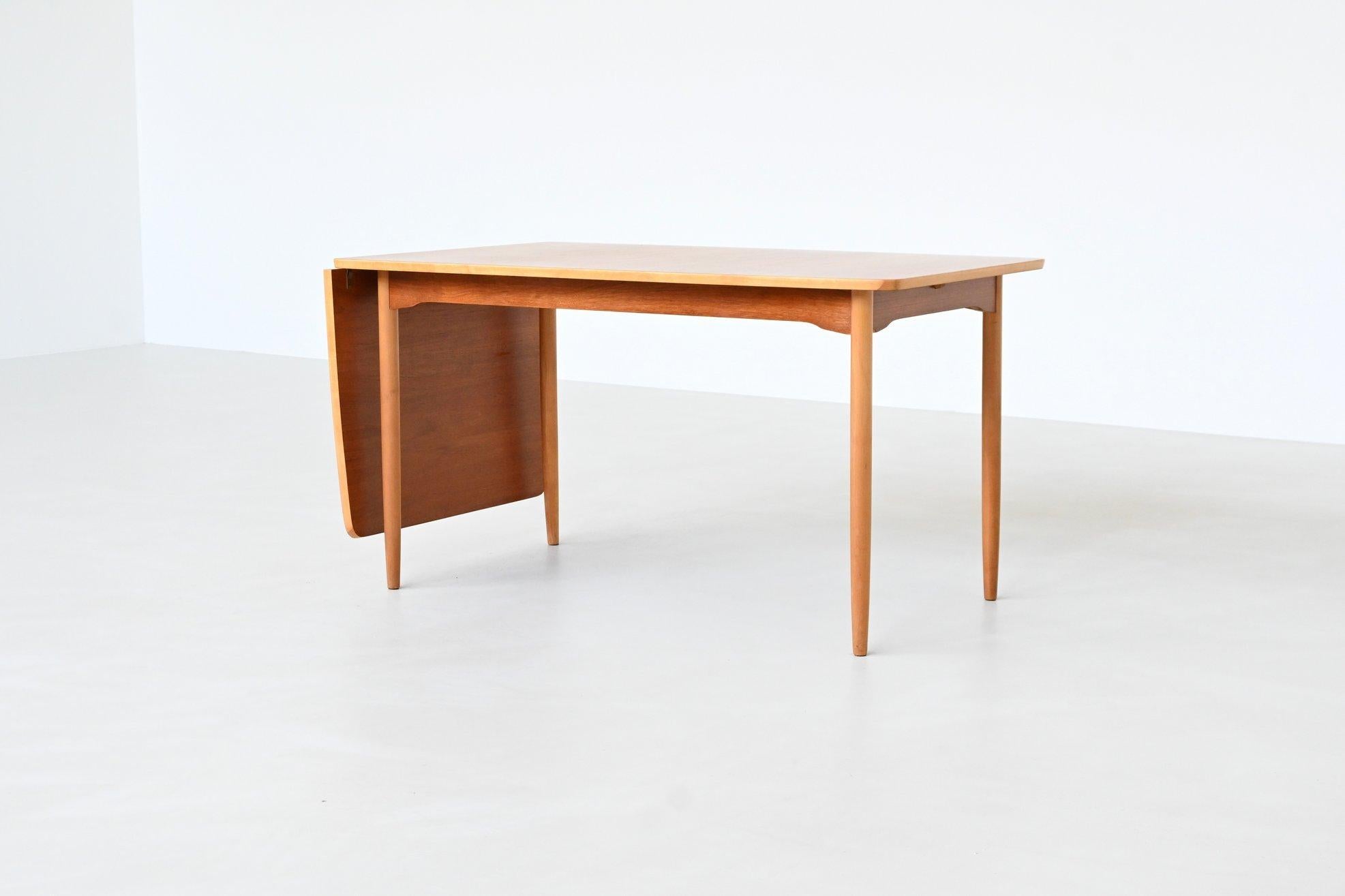 Danish Hans Wegner drop-leaf dining table in beach and teak Denmark 1950 For Sale