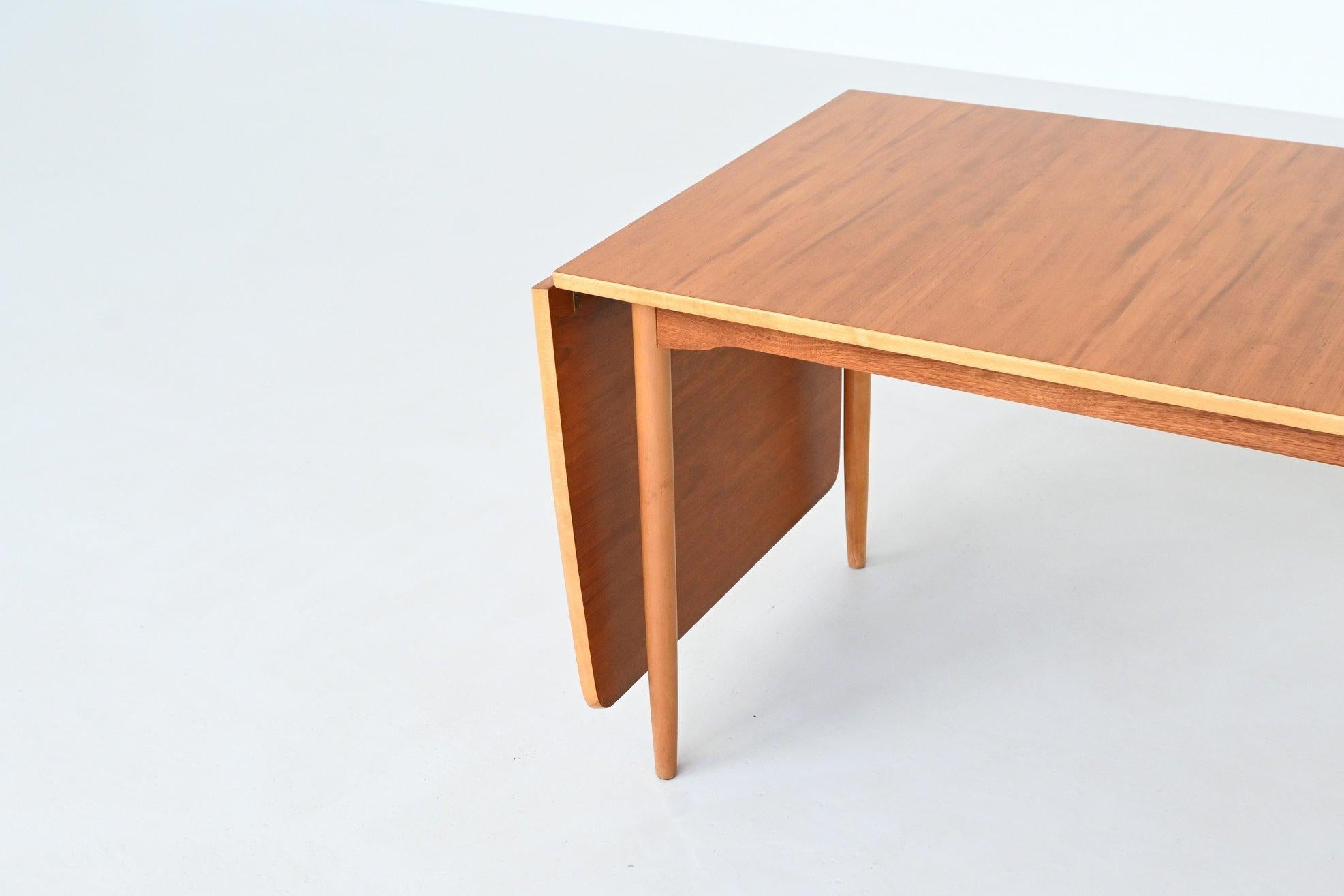 Mid-20th Century Hans Wegner drop-leaf dining table in beach and teak Denmark 1950 For Sale