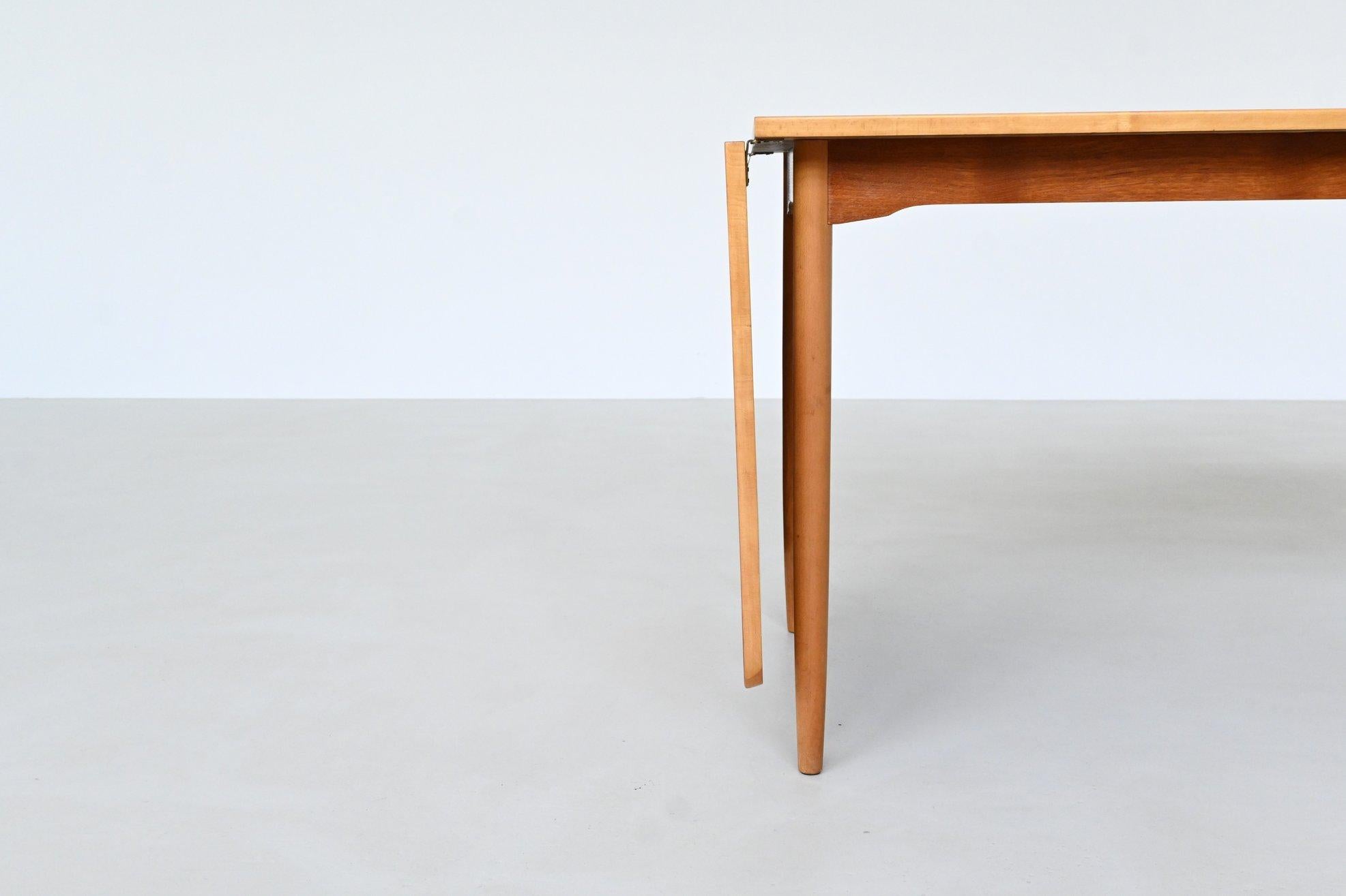 Beech Hans Wegner drop-leaf dining table in beach and teak Denmark 1950 For Sale