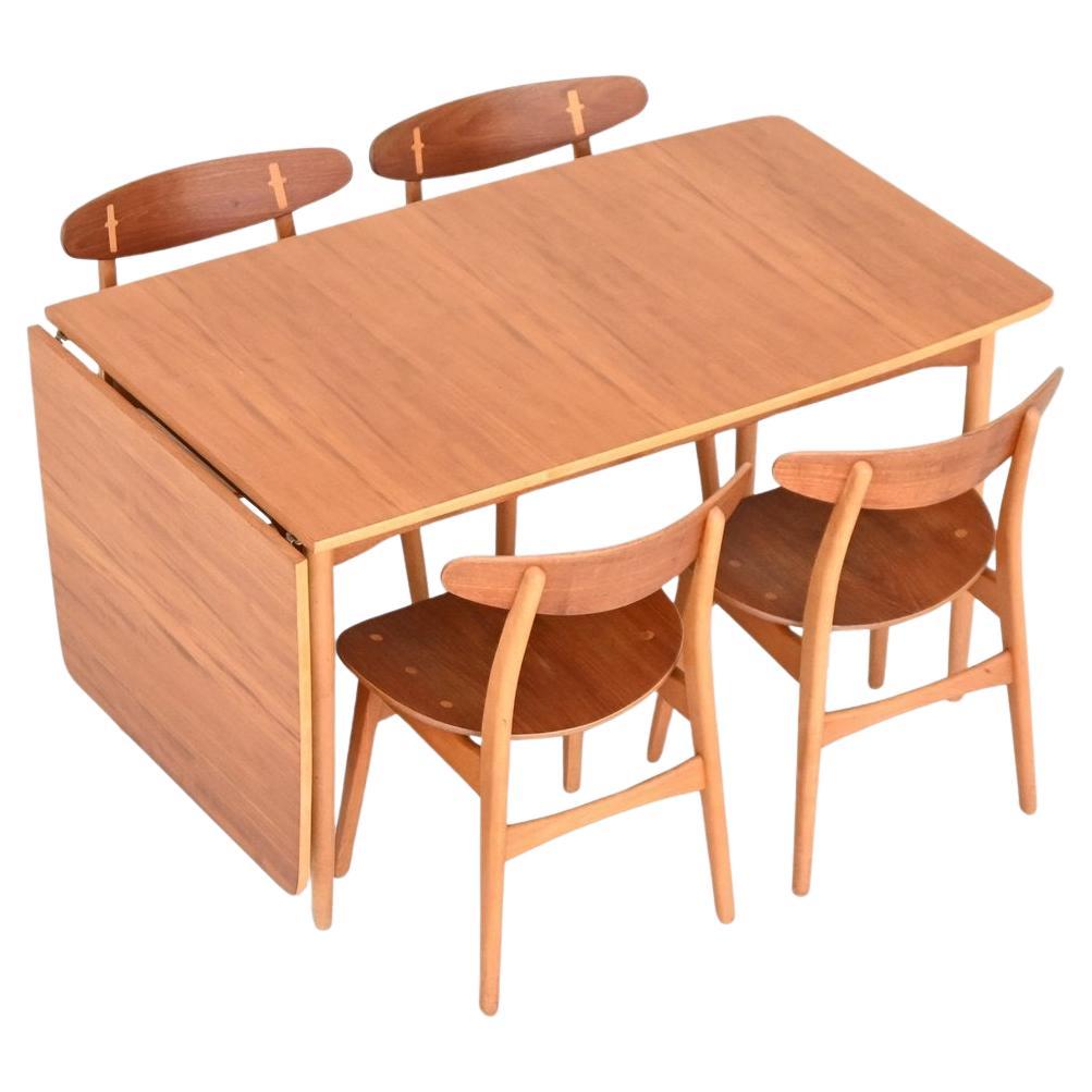 Hans Wegner drop-leaf dining table in beach and teak Denmark 1950 For Sale