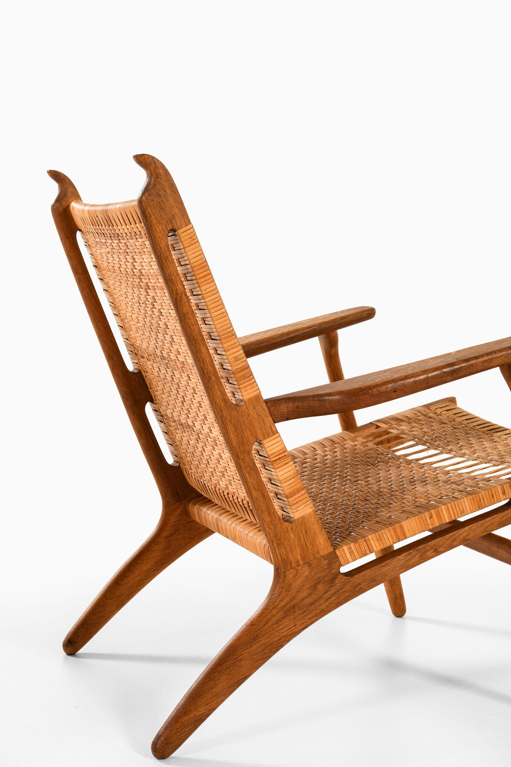 Rare pair of easy chairs model CH-27 designed by Hans Wegner. Produced by Carl Hansen & Son in Denmark.