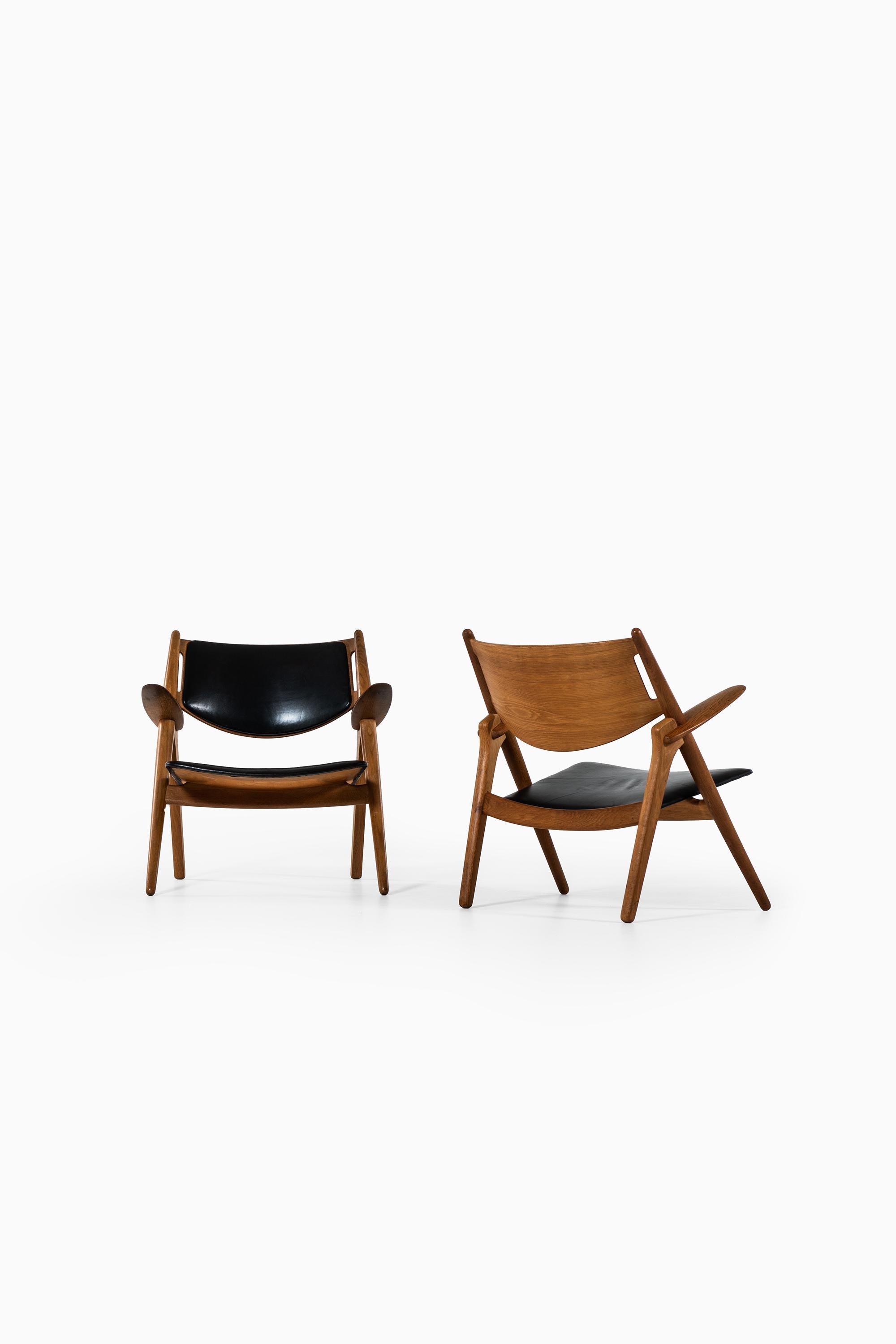 Scandinavian Modern Hans Wegner Easy Chairs Model CH-28 by Carl Hansen & Søn in Denmark For Sale