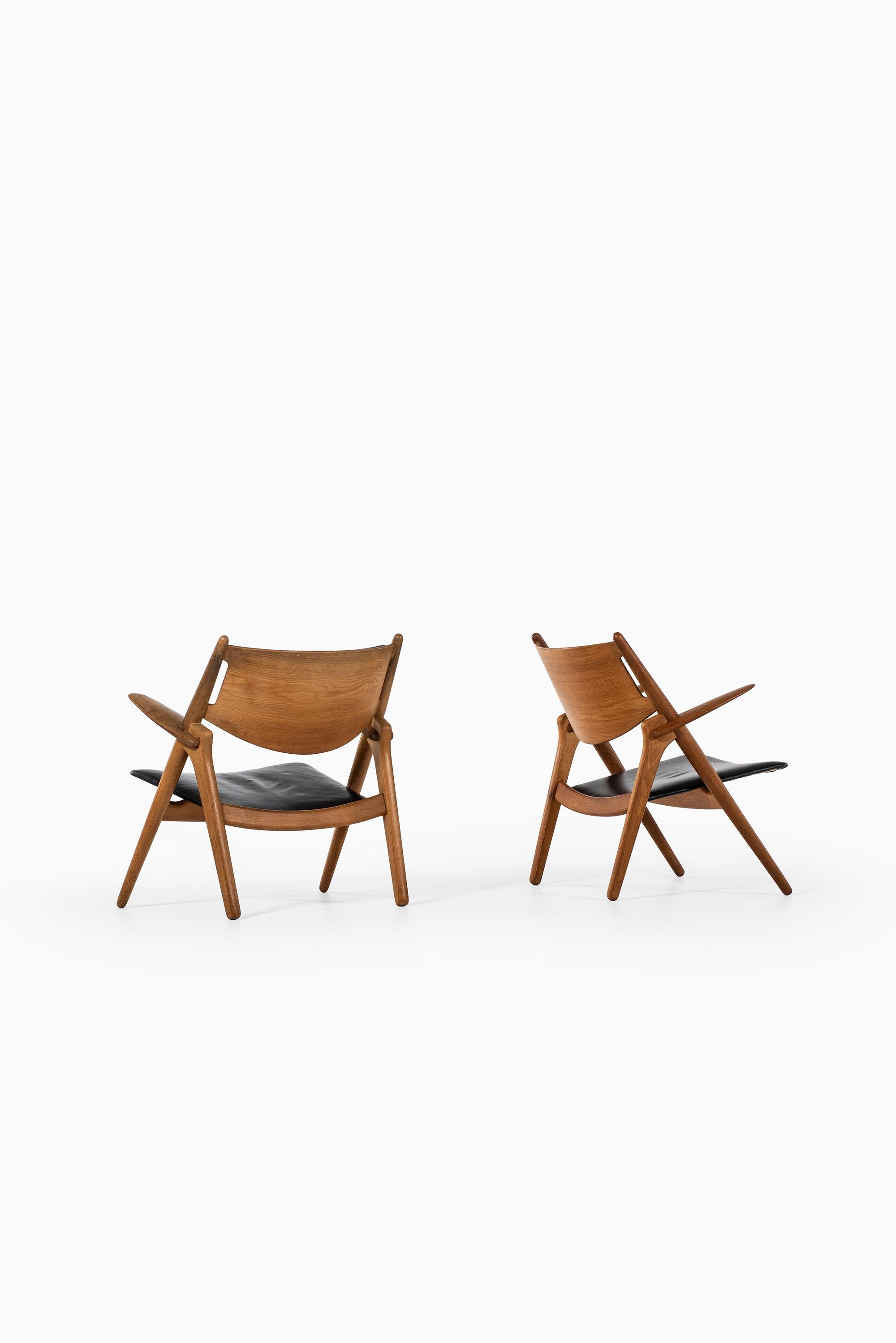 Leather Hans Wegner Easy Chairs Model CH-28 by Carl Hansen & Søn in Denmark For Sale