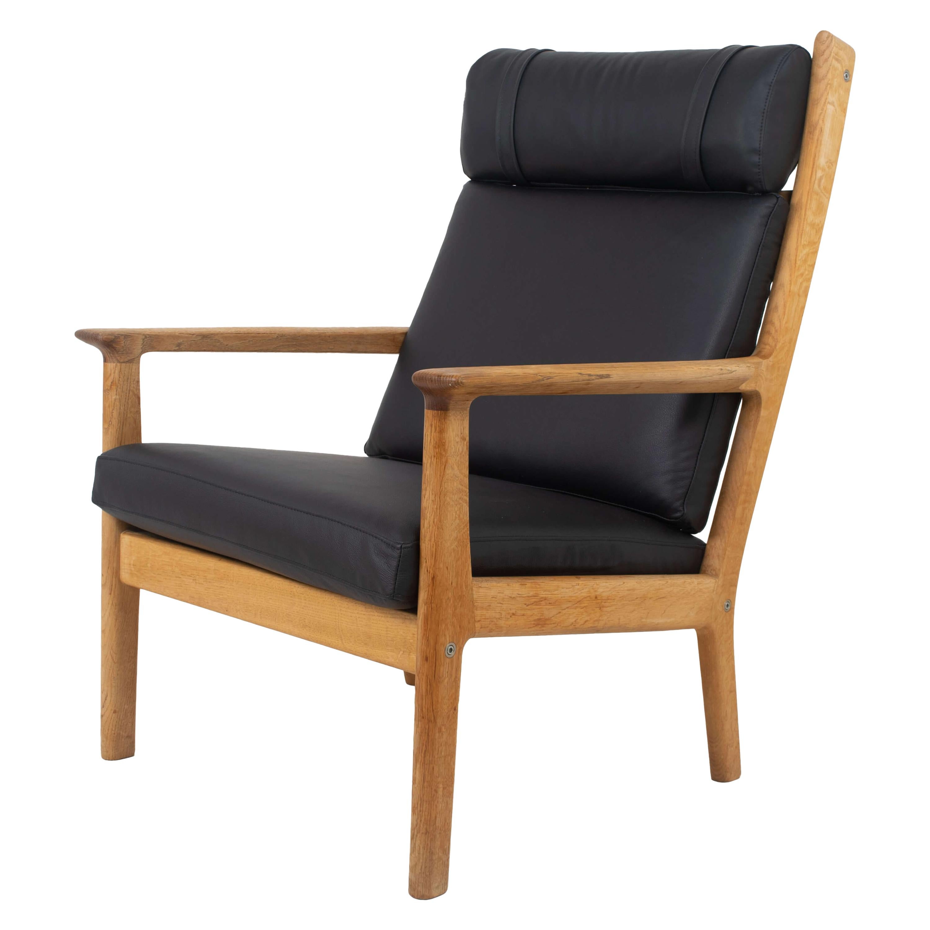 Hans Wegner Fauteuil GE 265 for GETAMA in Oak and Black Leather, 1980 For Sale