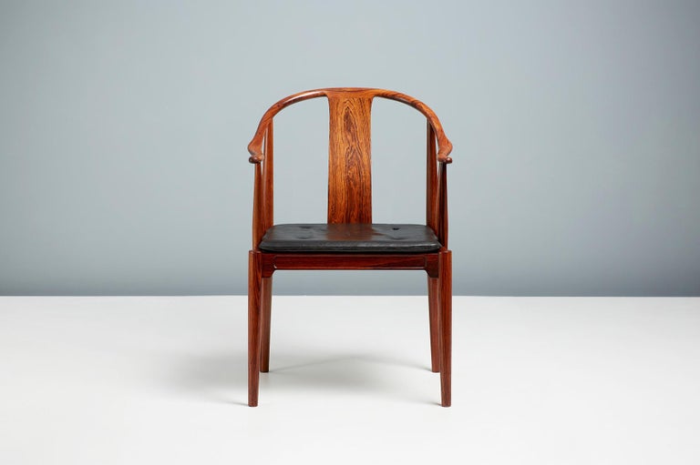 Hans J. Wegner

FH 4283 China chair, 1944.

Produced by Fritz Hansen in Denmark this version in exquisite Brazilian rosewood is an incredibly rare version of this iconic design made in very limited quantities in the 1960s. The chair retains its
