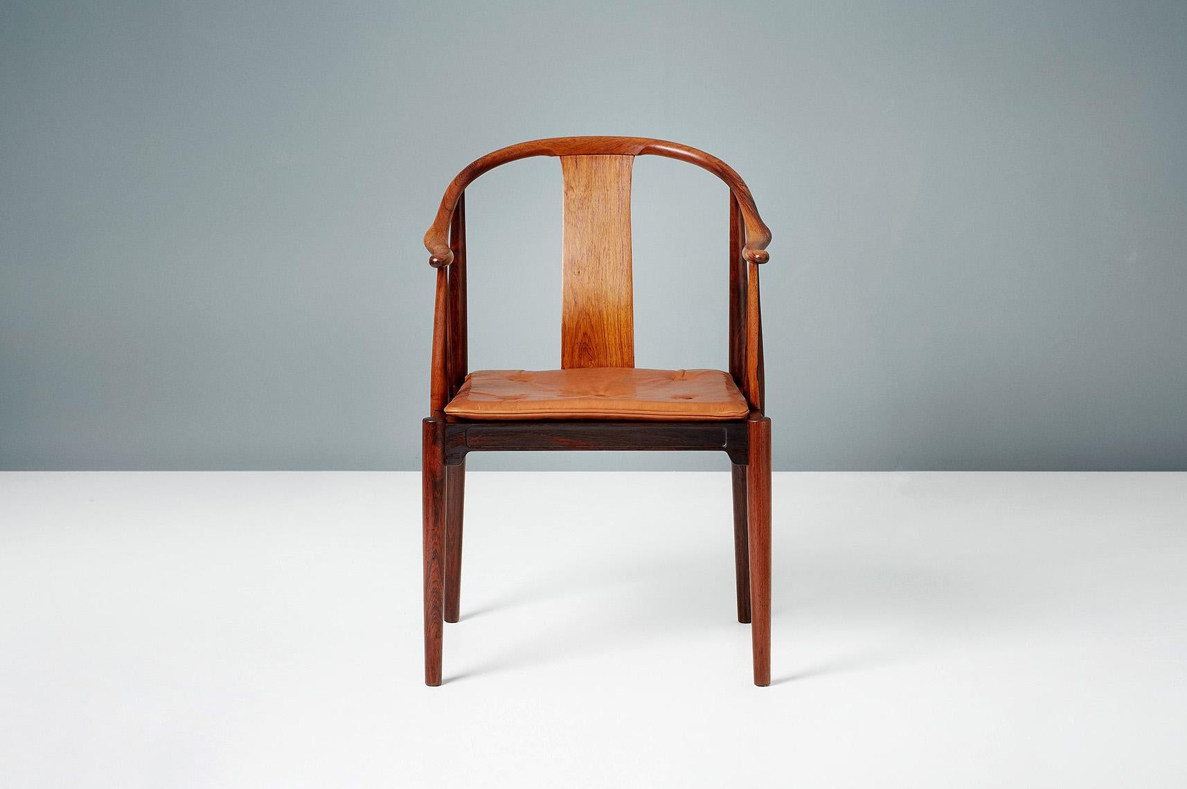 Hans J. Wegner

FH 4283 China chair, 1944

Produced by Fritz Hansen in Denmark this version in exquisite exotic hardwood is an incredibly rare version of this iconic design made in limited quantities in the 1960s. The loose seat cushion is covered