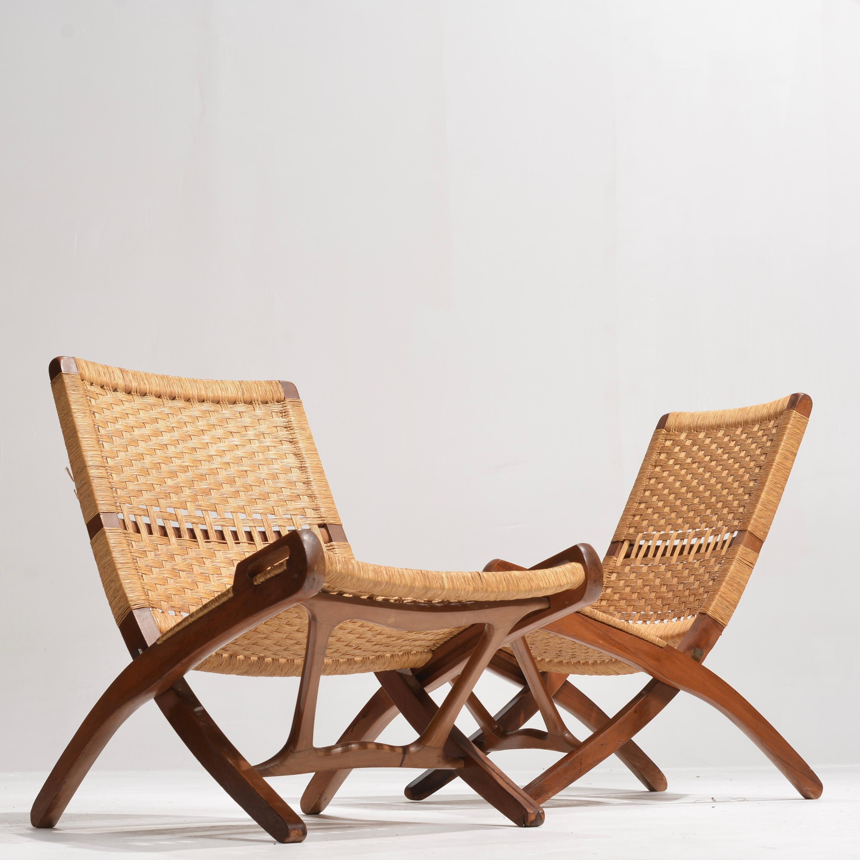 These chairs are a perfect compliment to any room or outdoor space. Sleek and minimal, and ready to compliment any atmosphere. In the style of Hans Wegner, and made in Yugoslavia. Foldable, sturdy design with elegant curved mahogany features.
