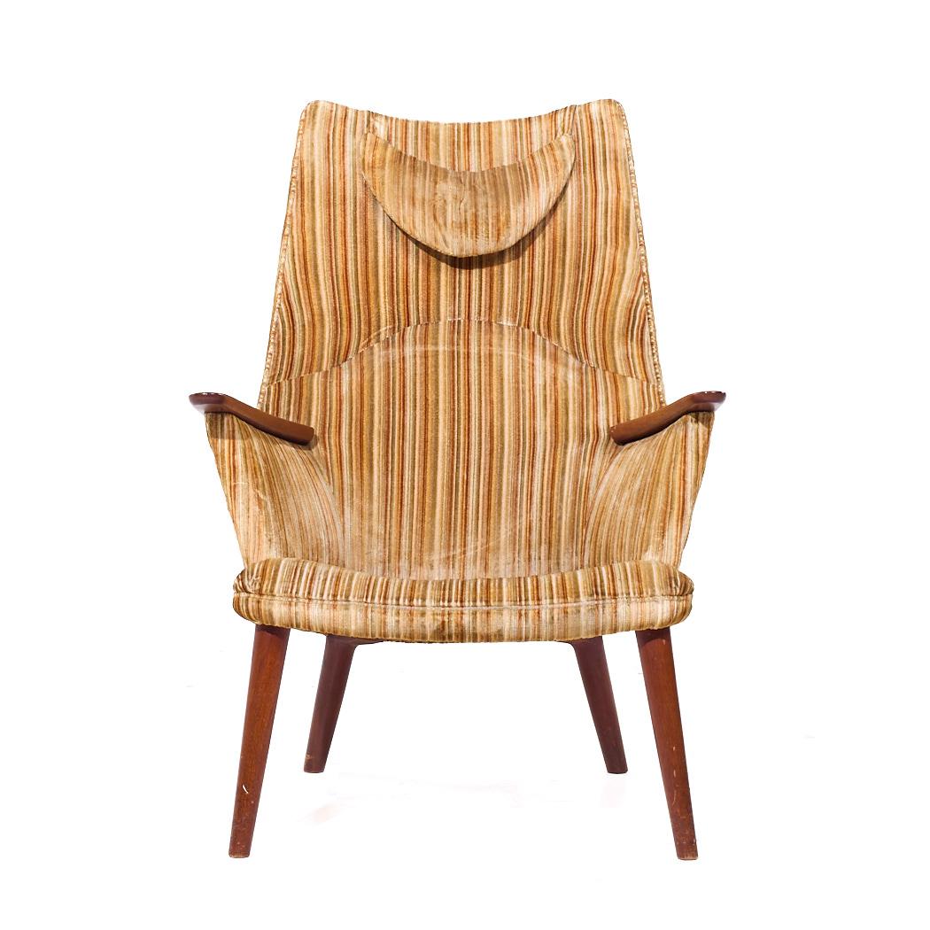 Hans Wegner for AP Stolen AP-28 Mid Century Danish Oak Mama Bear Lounge Chair

This lounge chair measures: 28.25 wide x 31 deep x 40.75 high, with a seat height of 14 and arm height/chair clearance 23.75 inches

All pieces of furniture can be had in