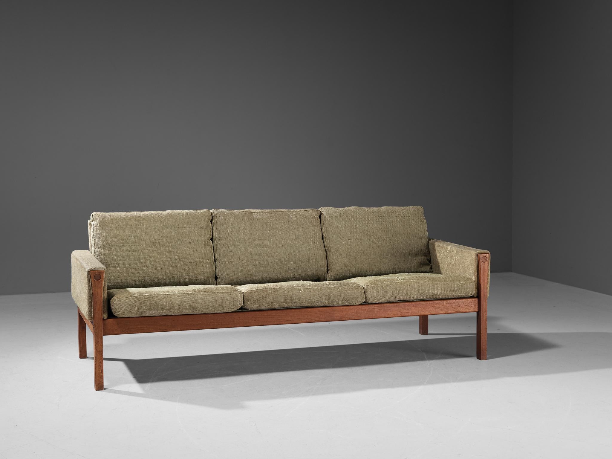 Hans J. Wegner for AP Stolen sofa, model 'AP 62/3', grey fabric, teak, Denmark, circa 1960

This streamlined sofa is characterized by a simplistic, natural and timeless aesthetics. The design features a solid construction of clear lines and