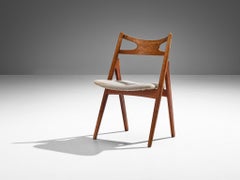 Hans Wegner pour Carl Hansen & Søn Chaise de salle à manger 'Sawbuck' en teck