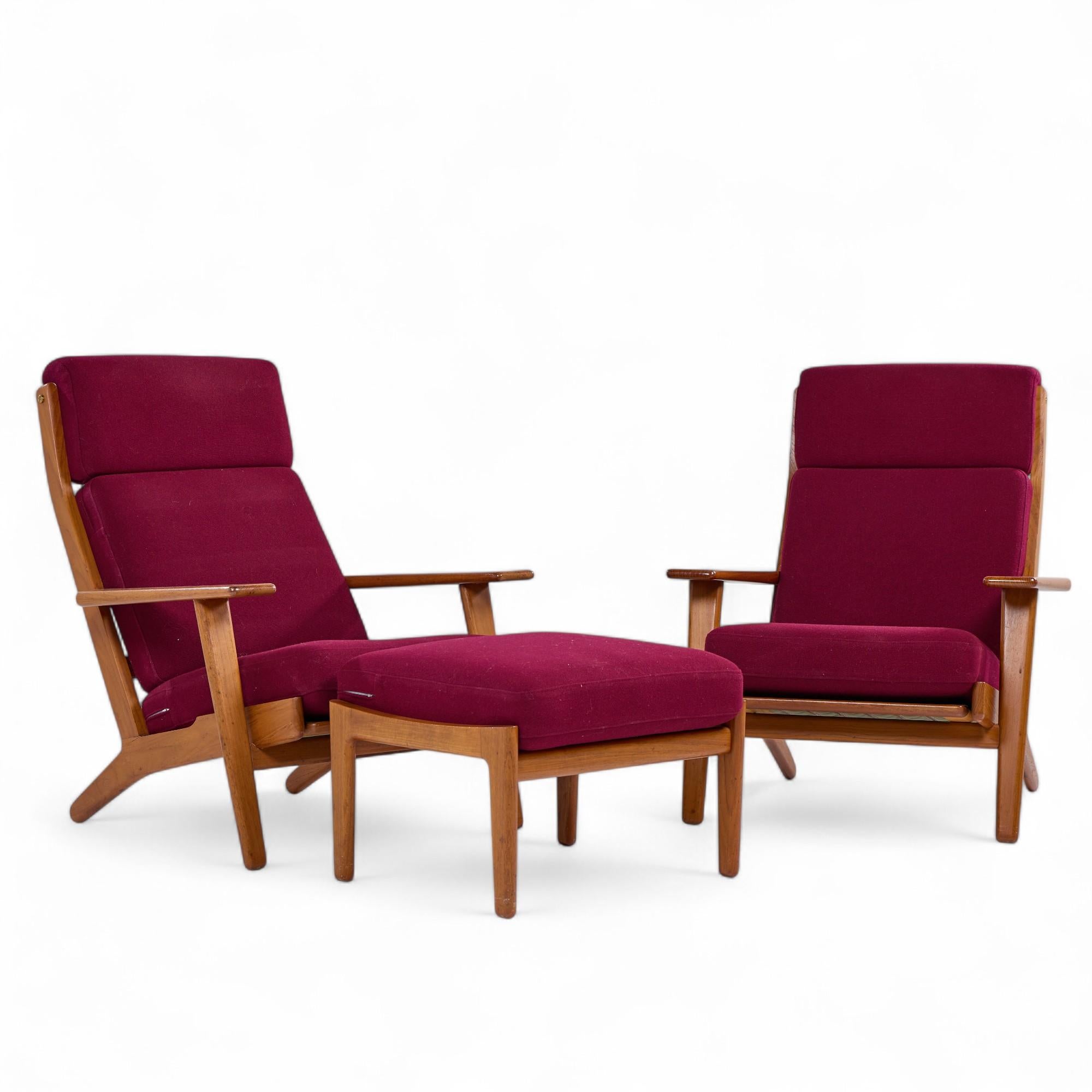 Hans Wegner for Getama GE-290 Mid Century Danish Teak High Back Lounge Chairs - Pair with Ottoman

Each chair measures: 29.75 wide x 35 deep x 37.25 high, with a seat height of 16 inches and arm height/chair clearance of 20.5 inches
The ottoman