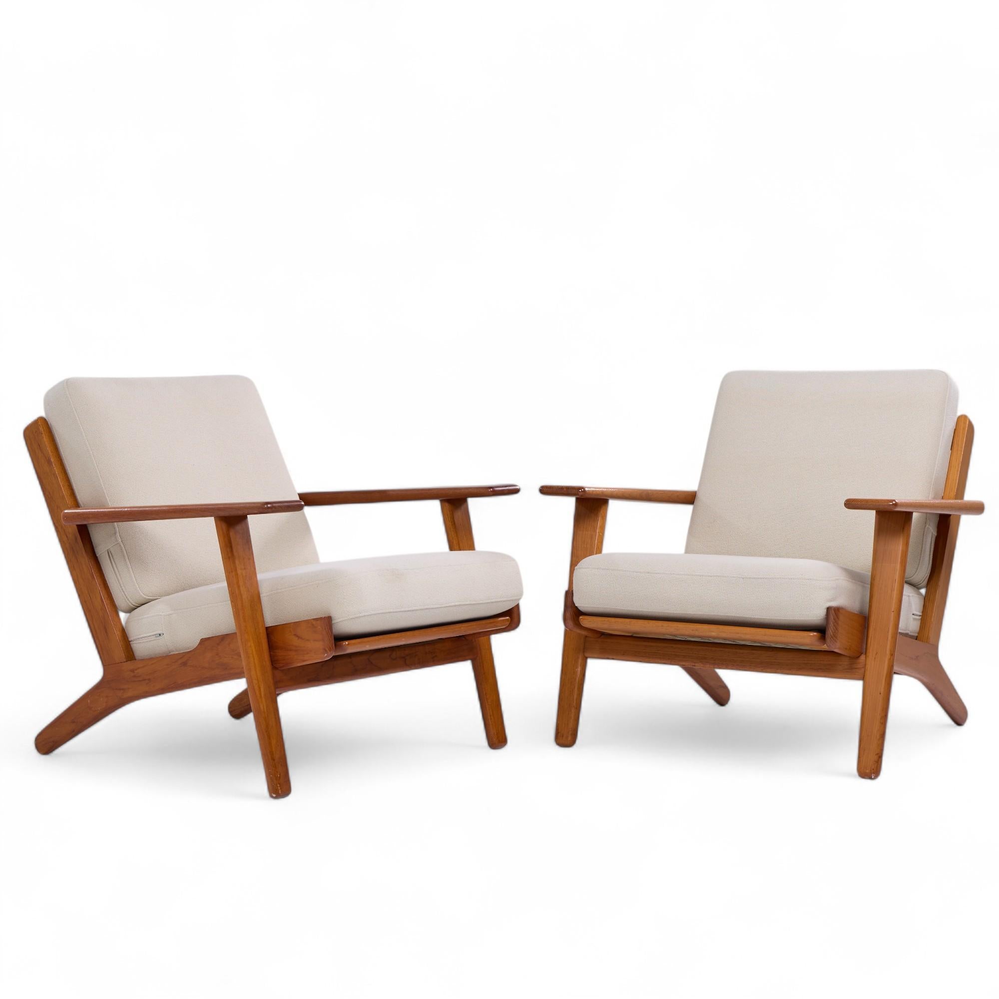 Hans Wegner for Getama GE-290 Mid Century Danish Teak Low Back Lounge Chairs - Pair

Each chair measures: 29.75 wide x 32 deep x 29 high, with a seat height of 15.5 and arm height/chair clearance of 20.75 inches

All pieces of furniture can be had