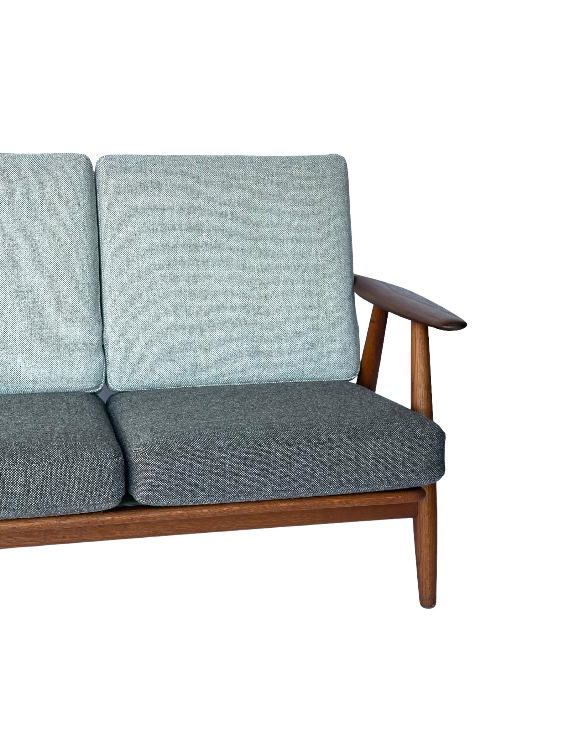 Scandinavian Modern Hans J. Wegner for Getama Signed Sofa with new Mataram Upholstery For Sale