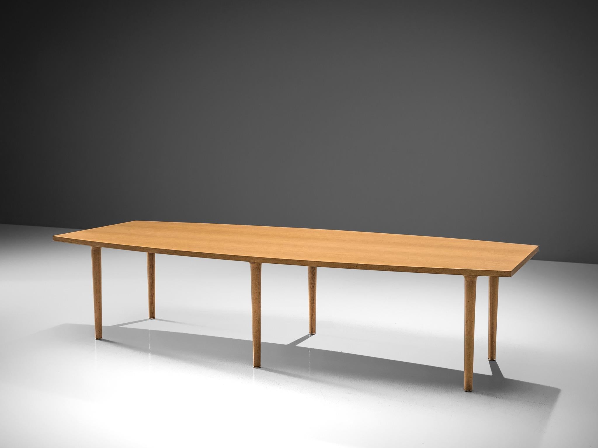 Hans J. Wegner for Johannes Hansen, boat shaped oak table, Denmark. 

This modest, simplistic conference table is designed by Hans J. Wegner and produced by Johannes Hansen. The table features six tapered legs and a large, light oak top. The