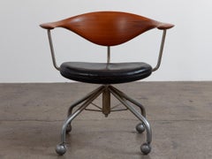 Hans Wegner  for Johannes Hansen Teak JH502 Swivel Chair in Black Leather